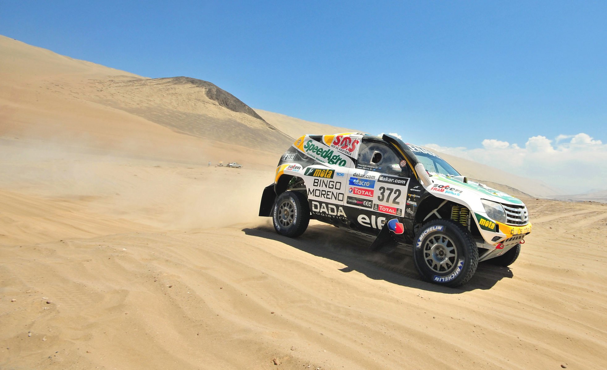 renault dakar rally sports sand desert car machine suv a side view speed race