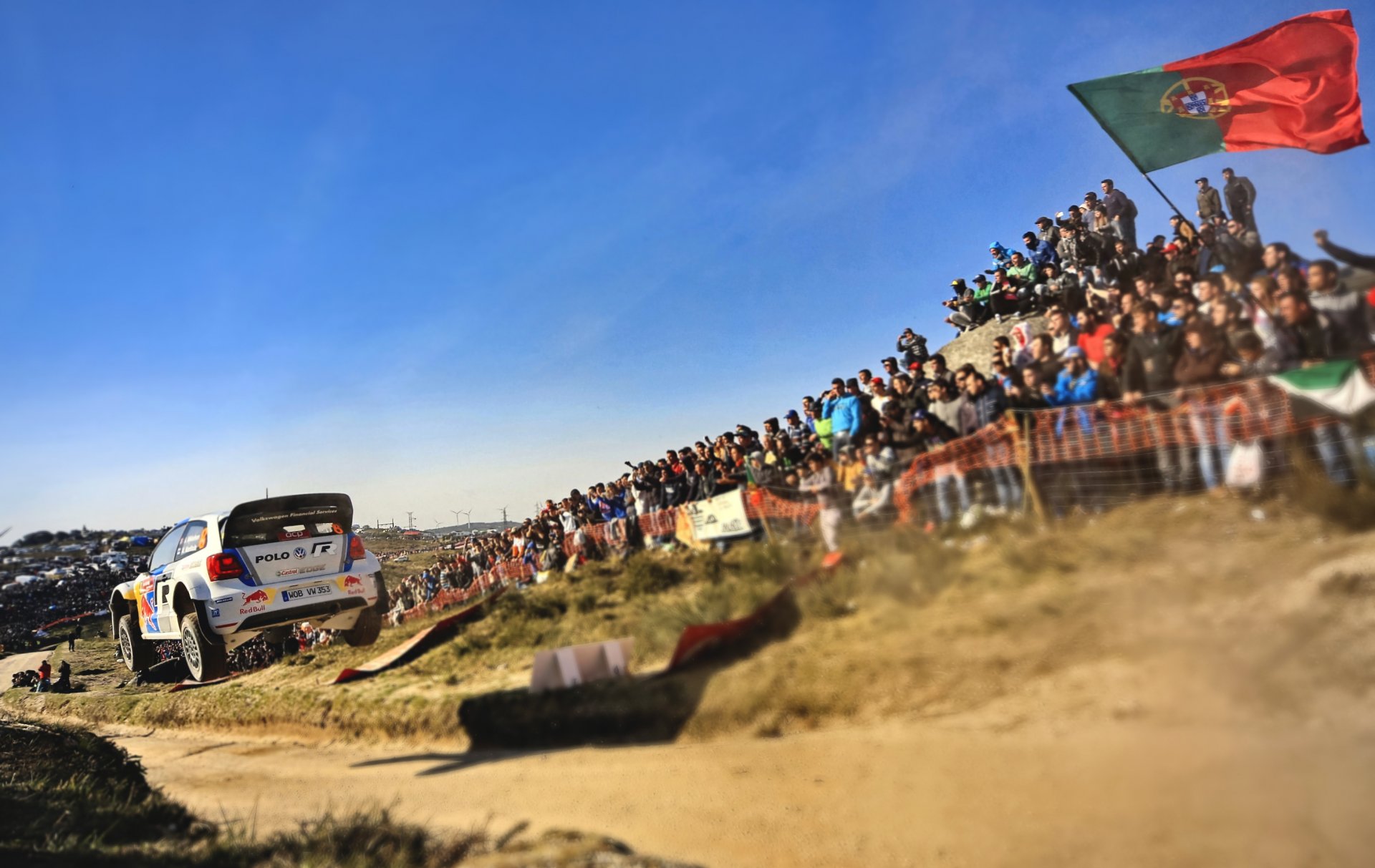 volkswagen polo wrc rally sports machine white car red bull speed people heat flies portugal 2013 fans