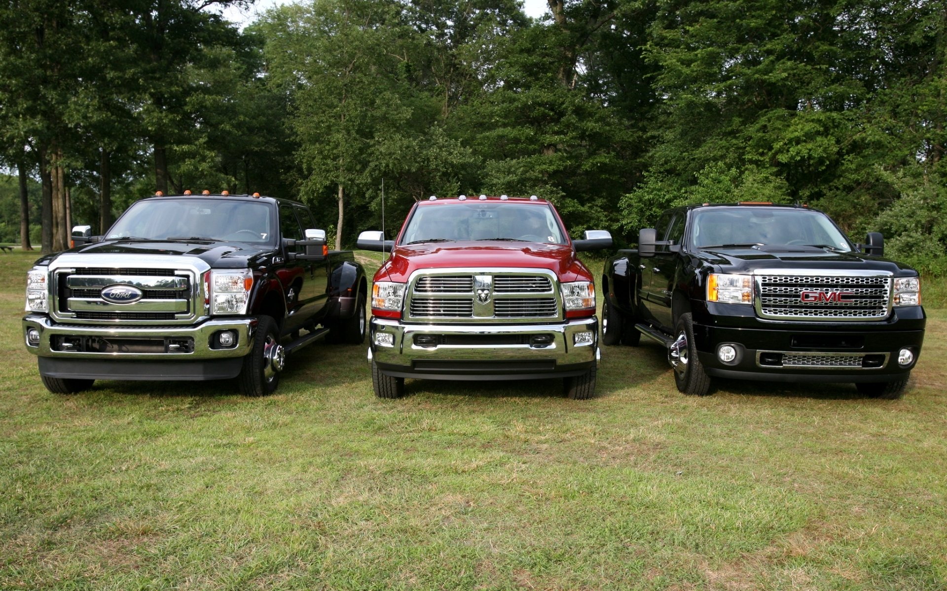 ford f450 super duty and dodge ram heavy duty crew cab gmc sierra denali hd slt dzhiemsi truck jeep front tree background