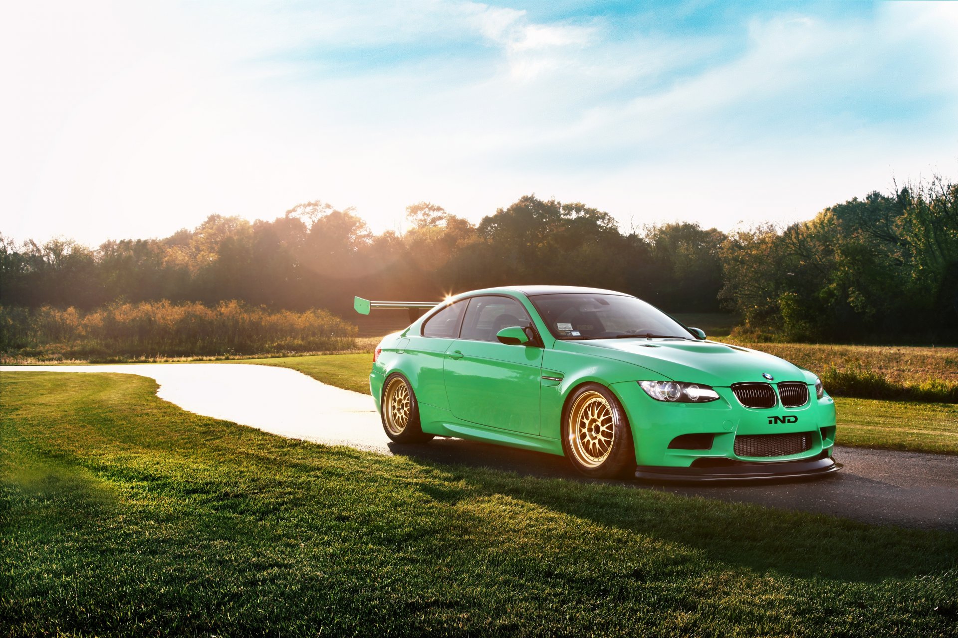 ind bmw m3 coupe green hell s65 e92 front race car sky sun highlight