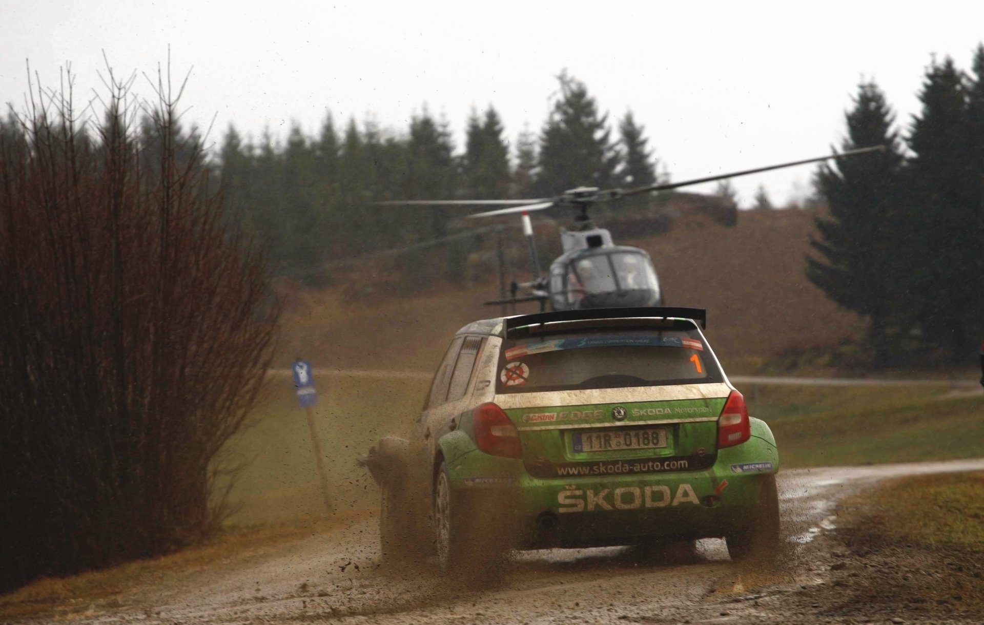 skoda fabia rally wrc car machine race sports vehicles helicopters dirt rain dirty