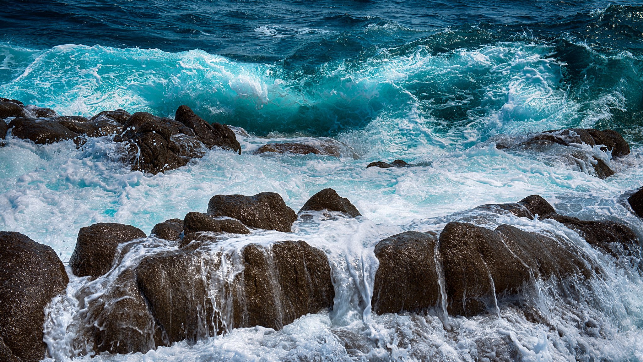 sea waves spray stones rock