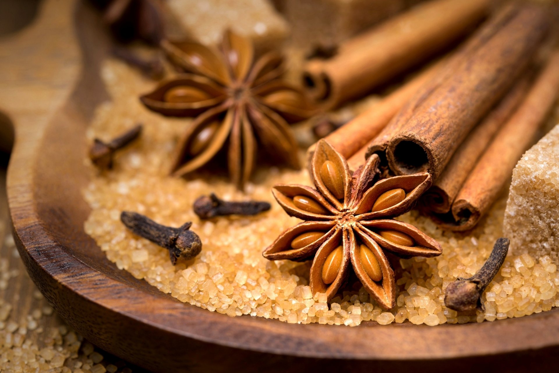 anise stellate star anise carnation sticks cinnamon sugar spices saucer