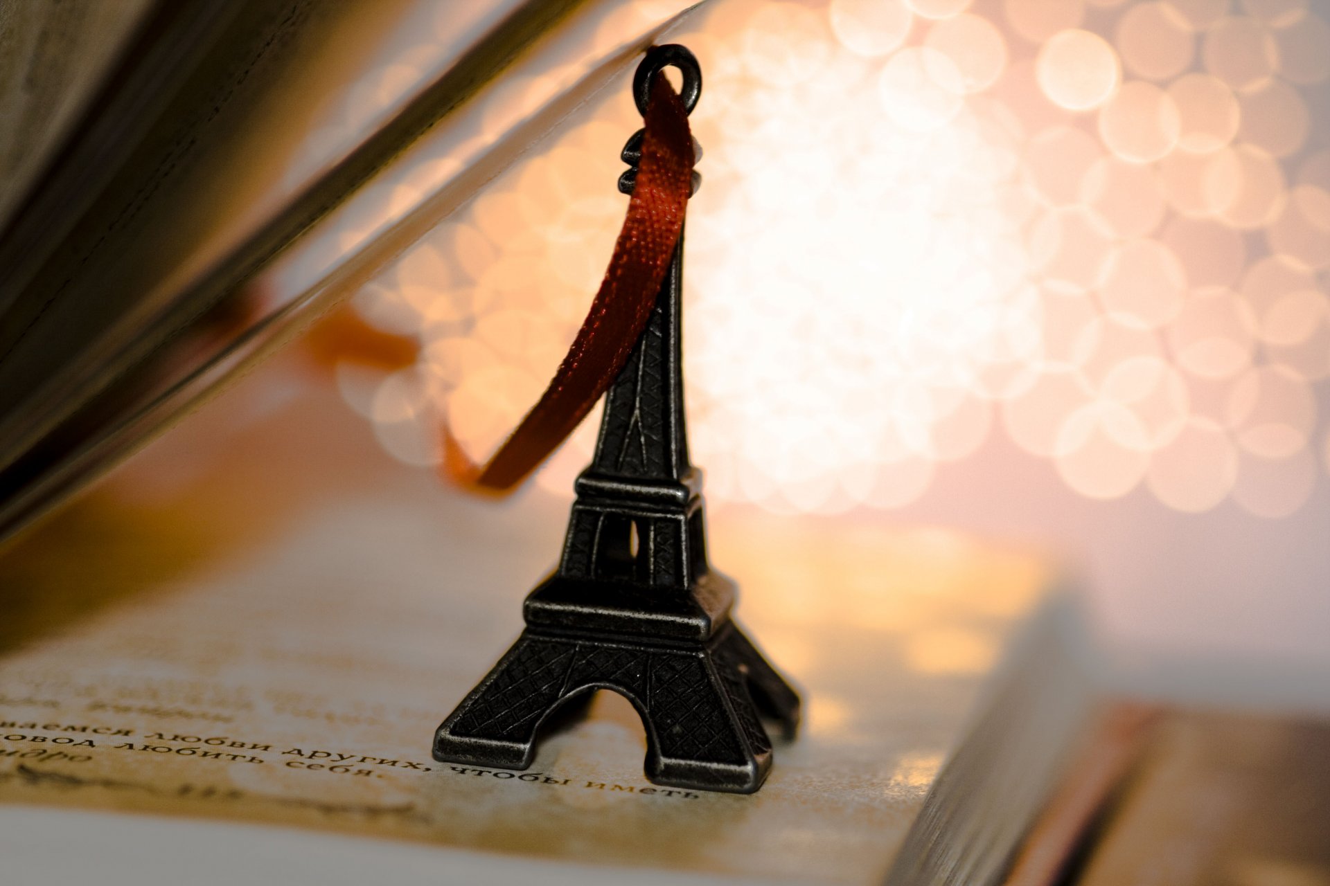 eiffel tower souvenirs statue keychain belt book pages lines