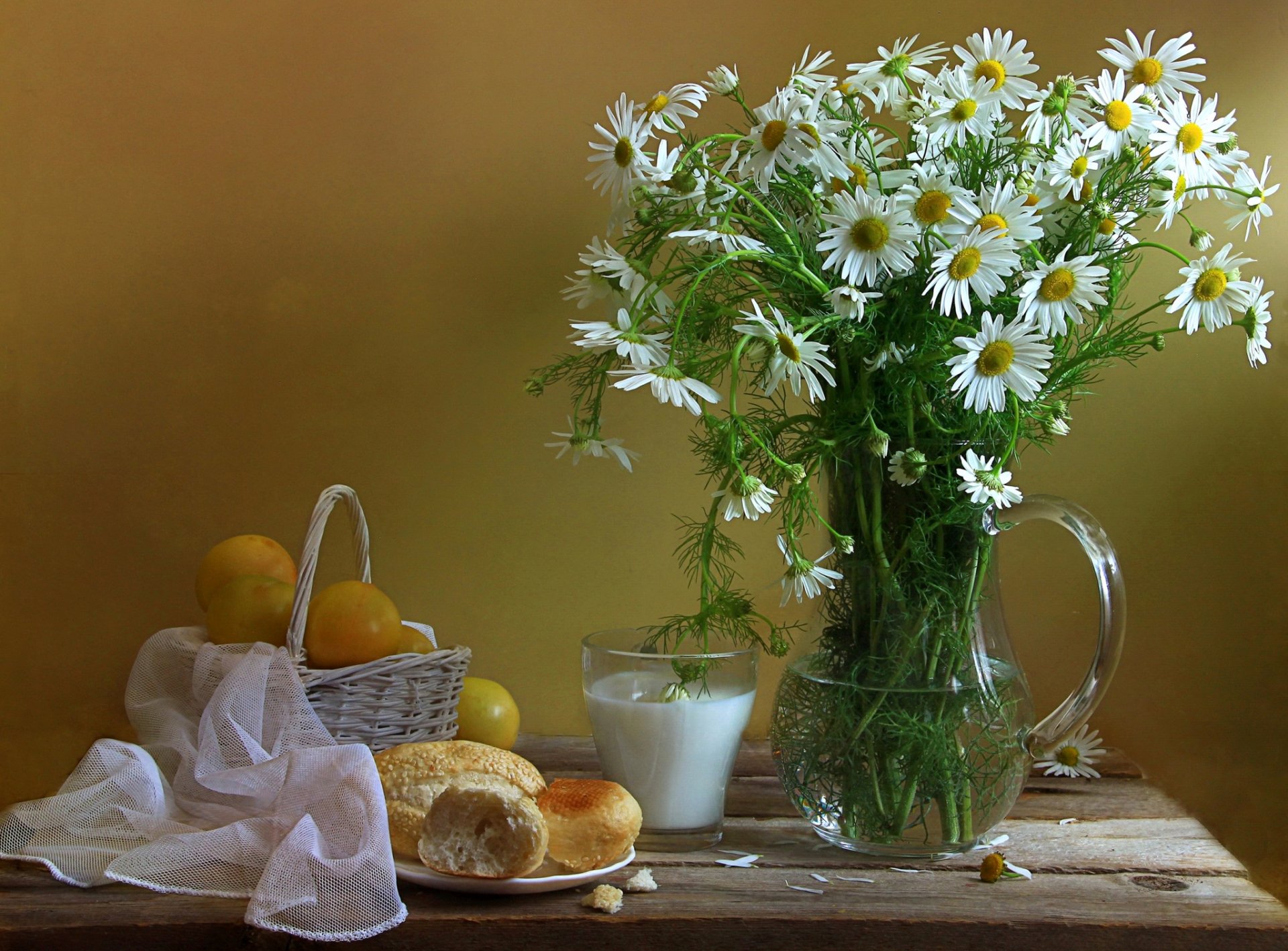 still life pitcher glass basket plum flower chamomile bun milk