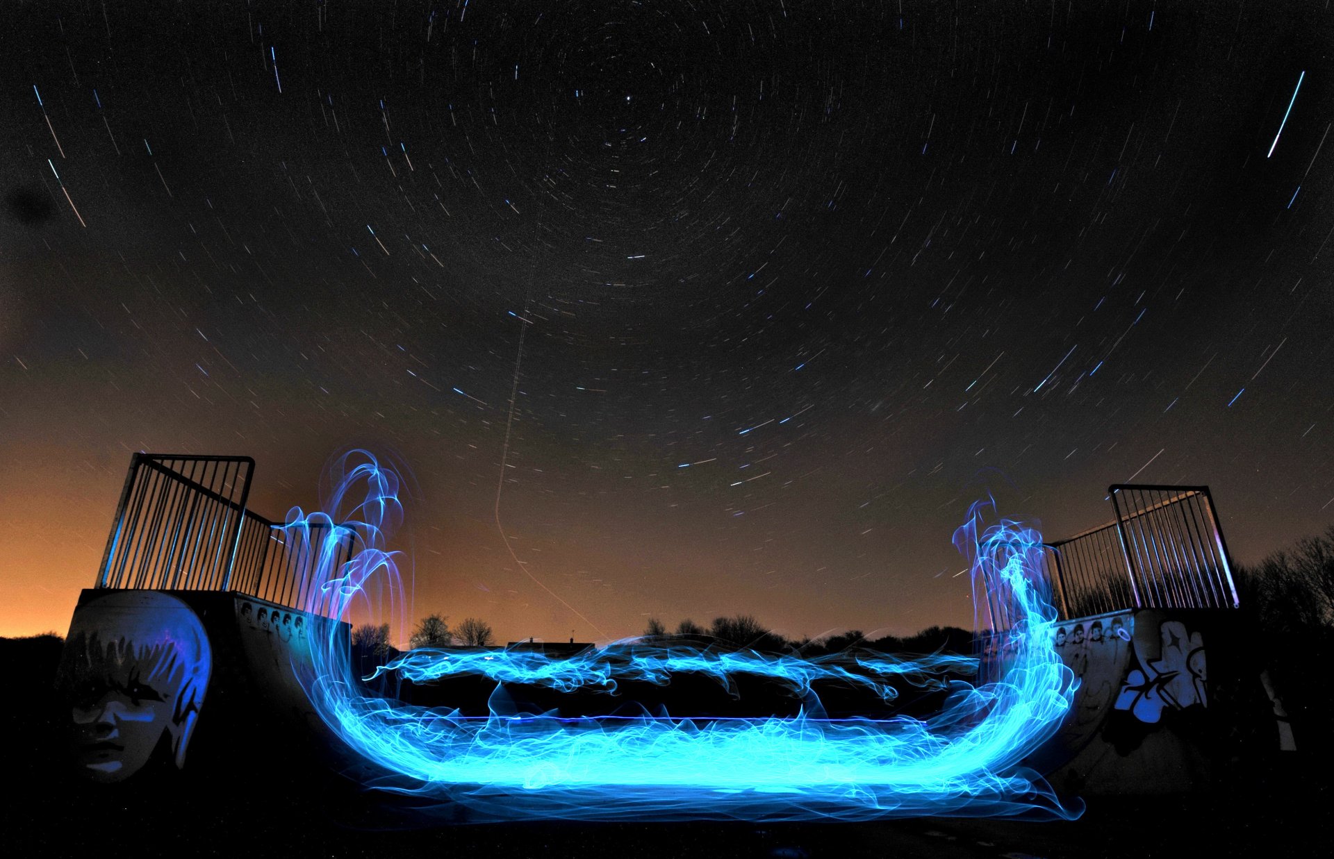 sky the stars ramps flame skate boarding graphics graffiti creative circular movement tops of trees roof