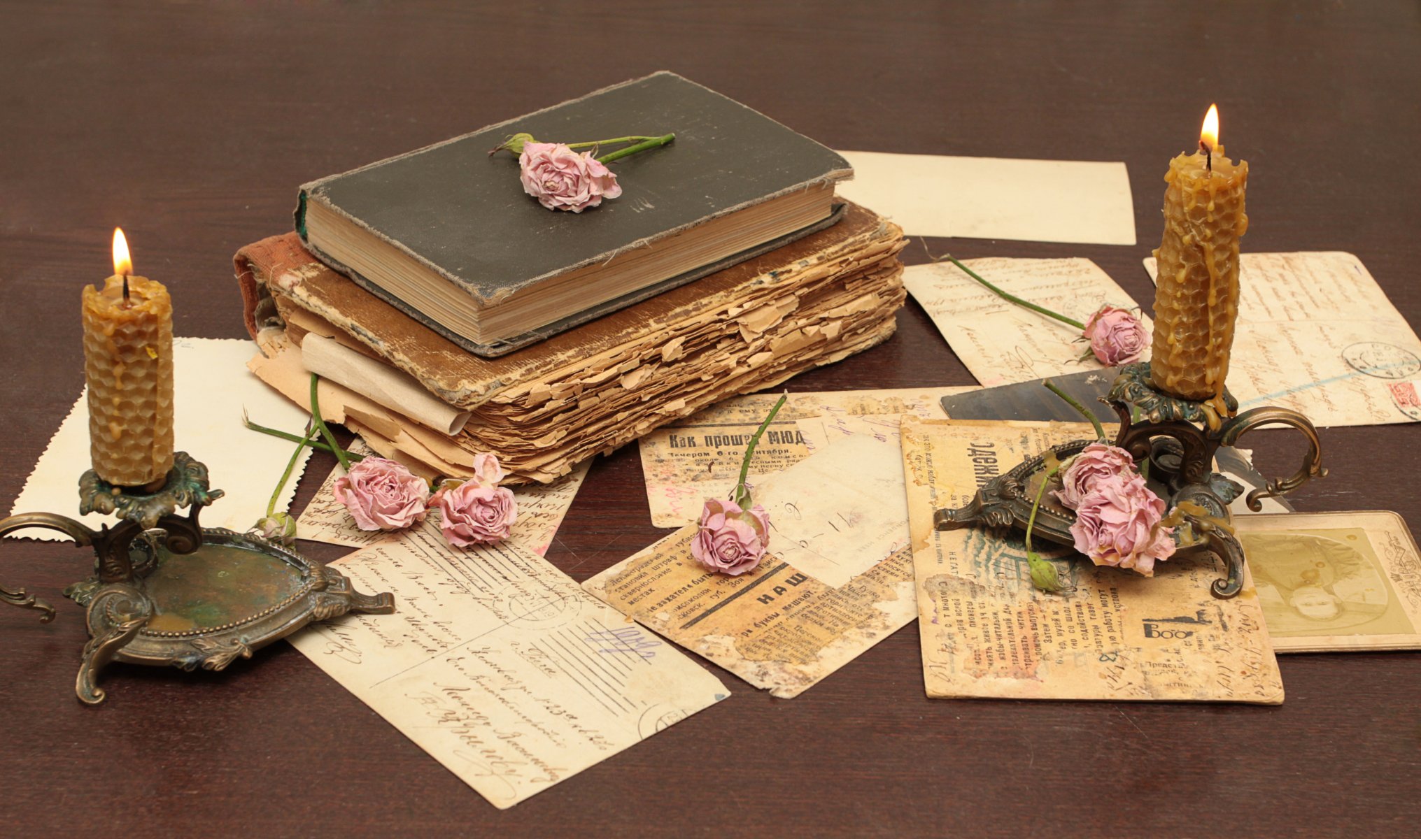 vintage books the old flower roses candles candle holders a letter cards paper table