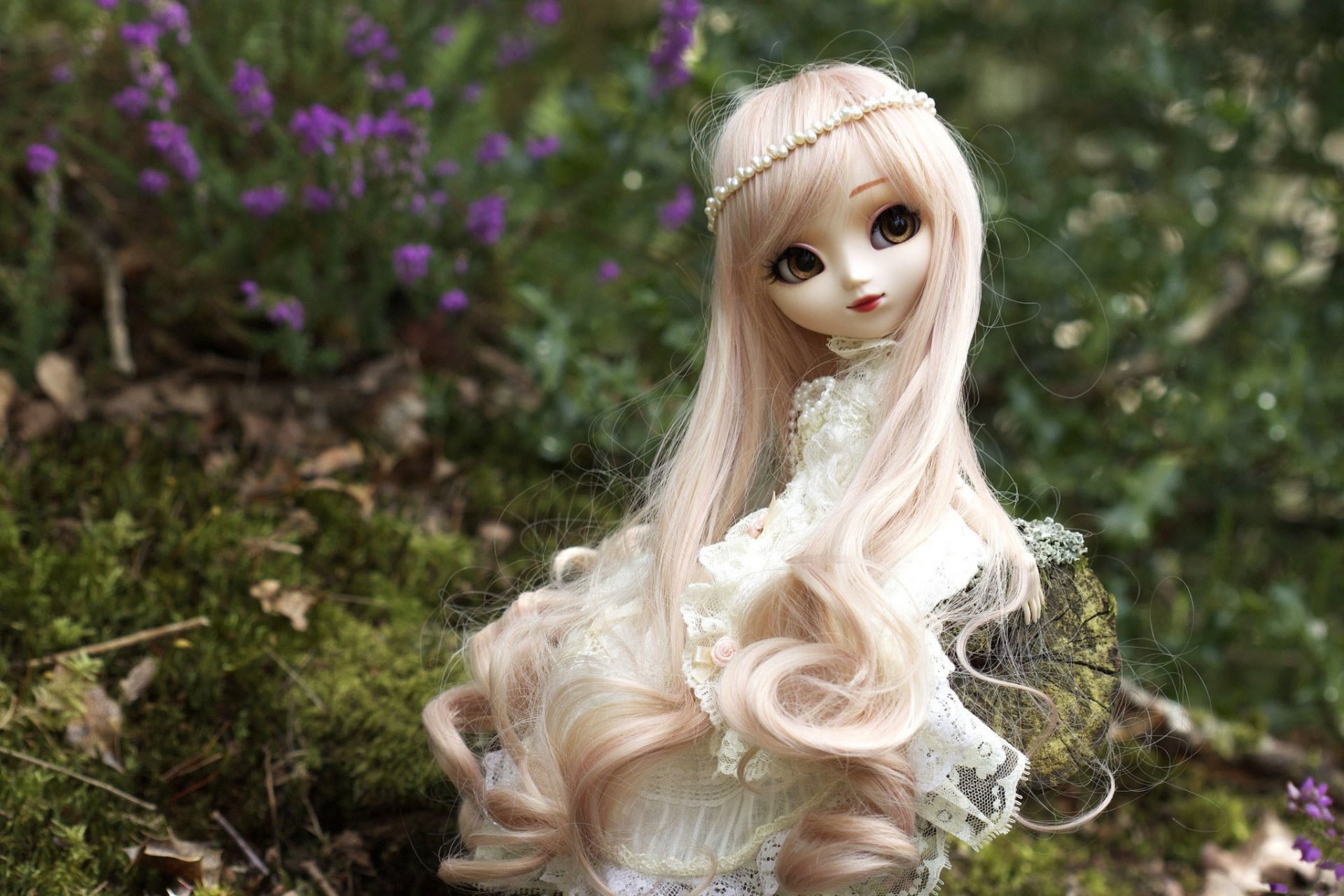 doll toys long hair blonde sitting