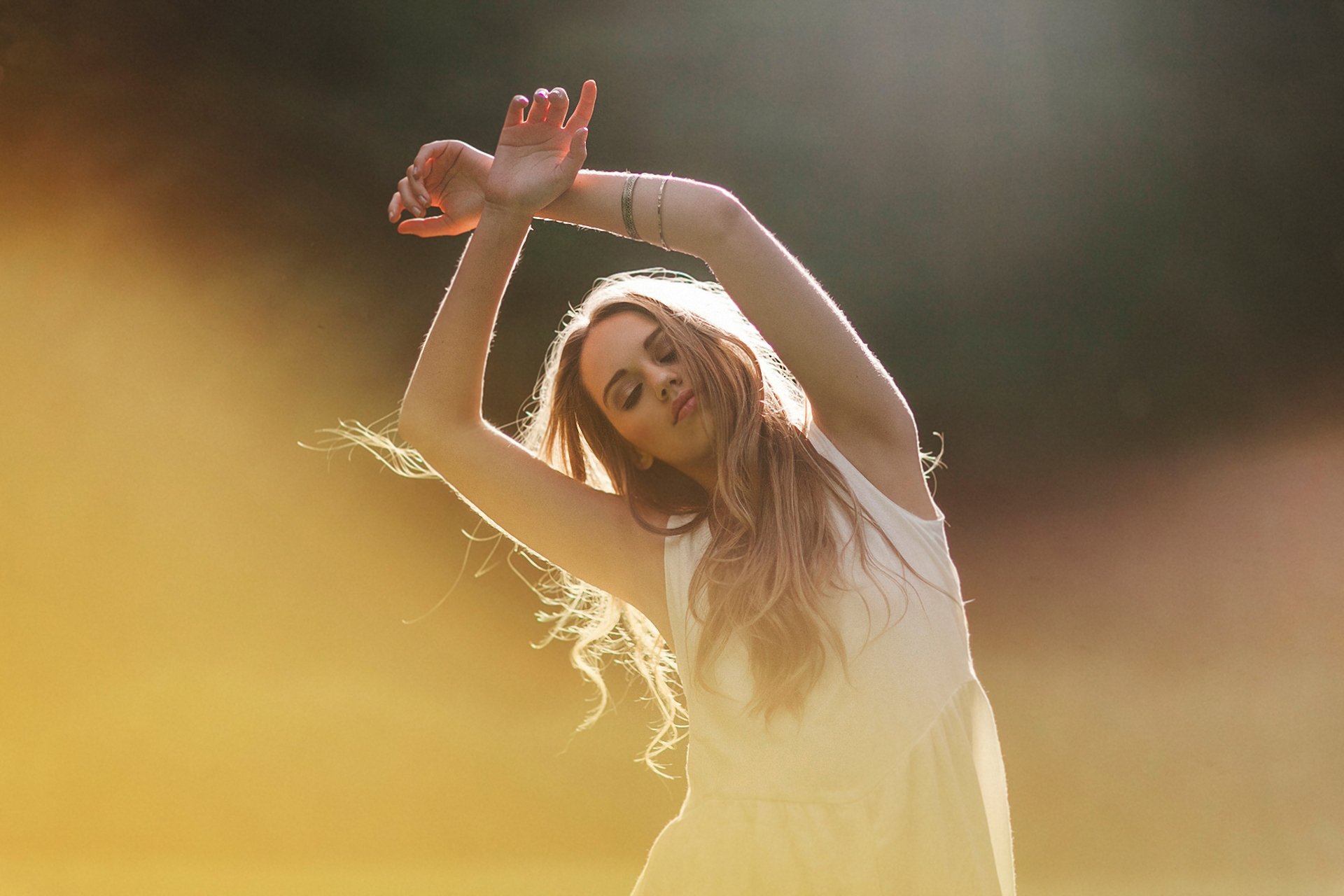 girl blonde locks bracelets
