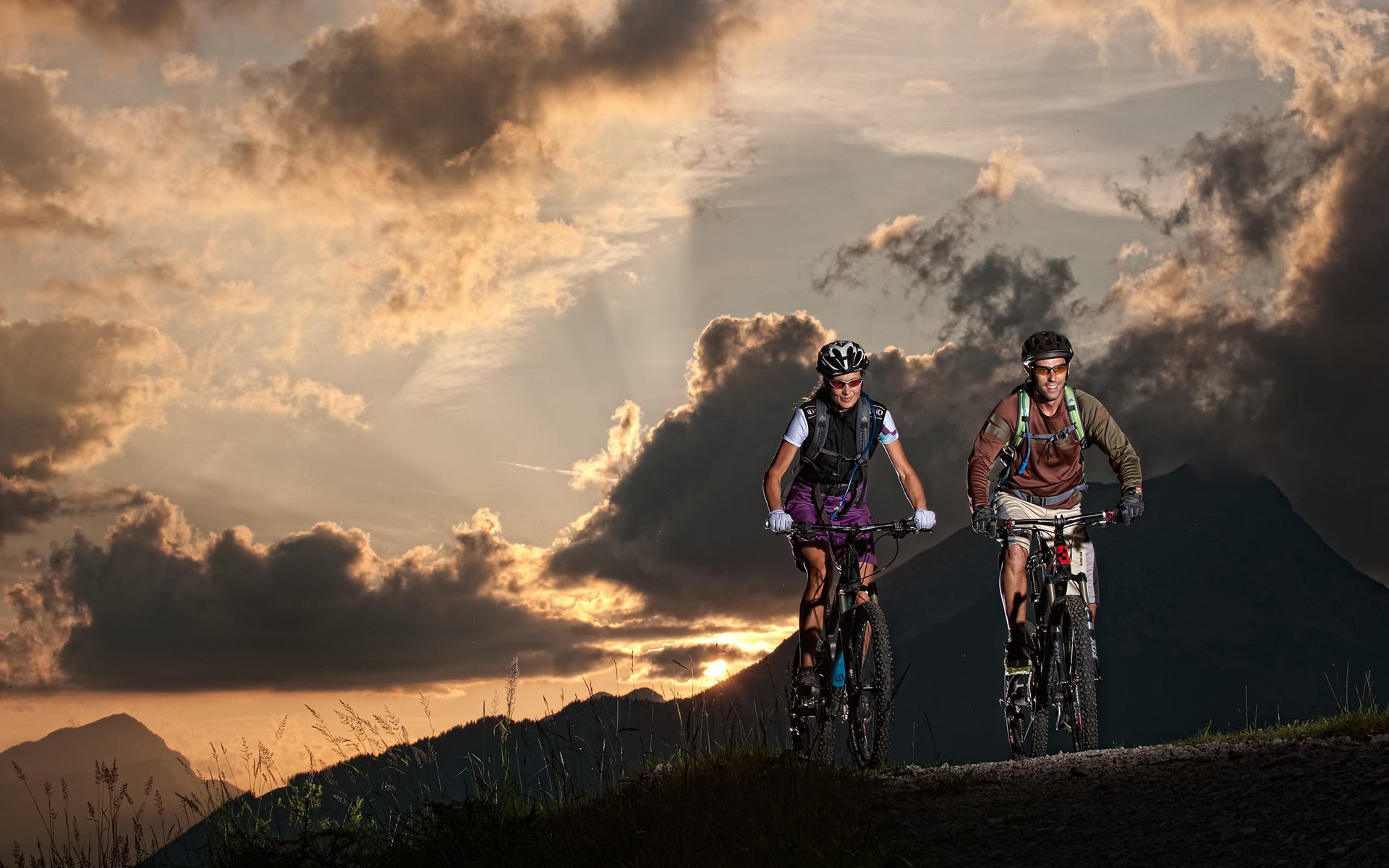 men a woman cyclists tourists night nature