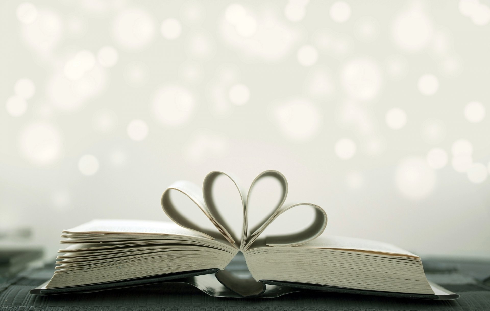 book pages heart cover bokeh