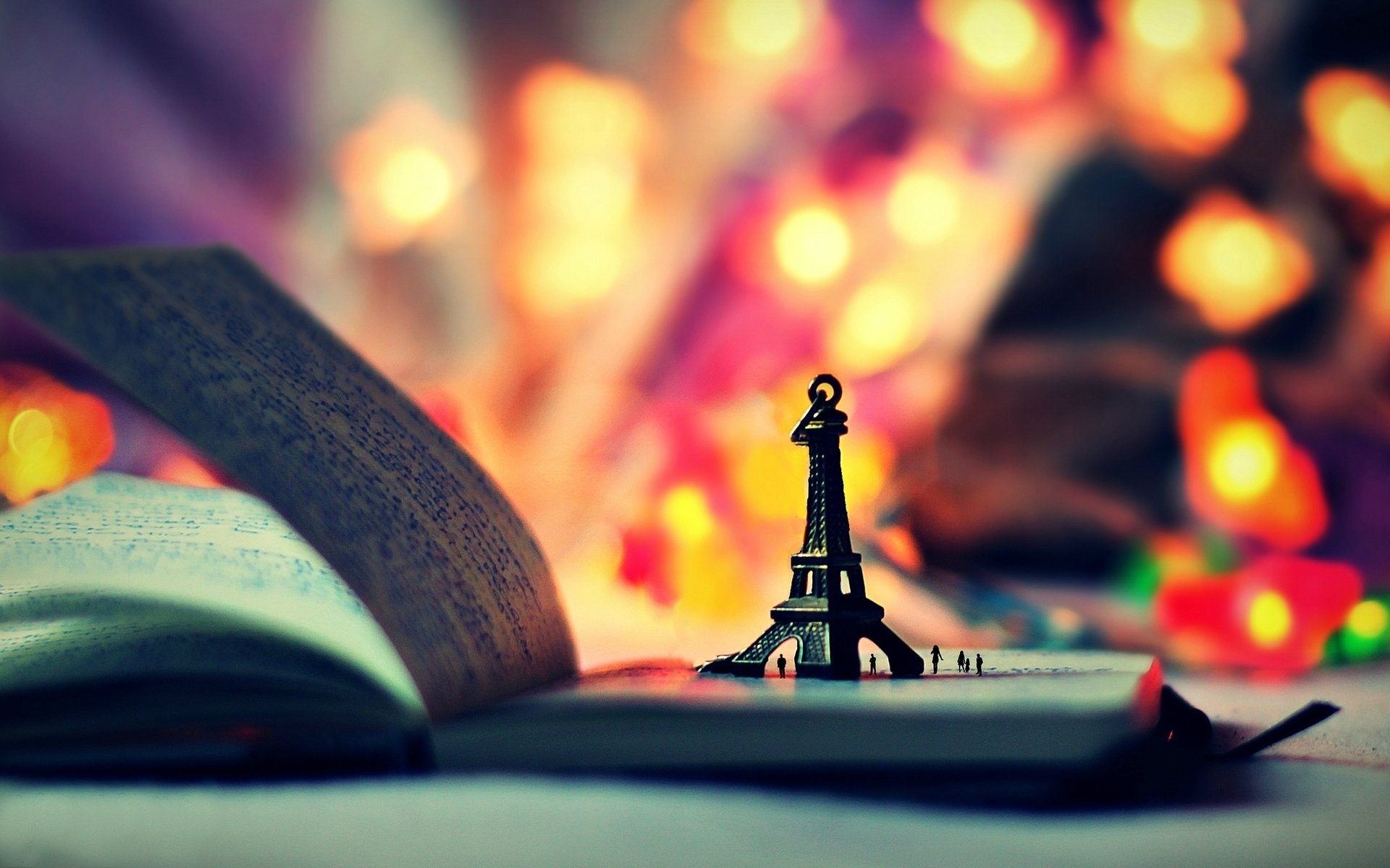 mood toys statue eiffel tower book notebook lights bokeh background wallpaper widescreen full screen hd wallpapers fullscreen