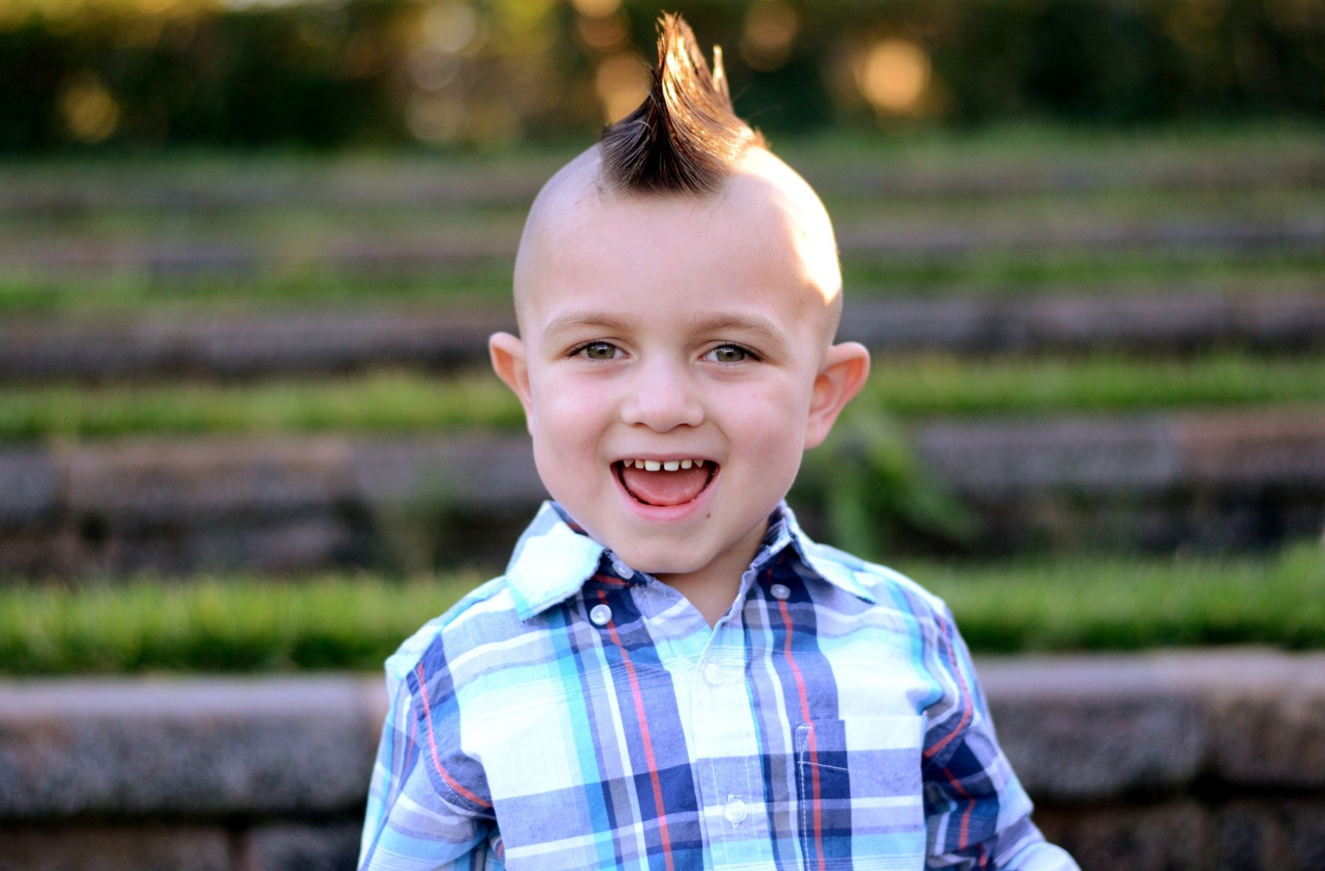 child babe boys hair hair style mohawk smile teeth ears