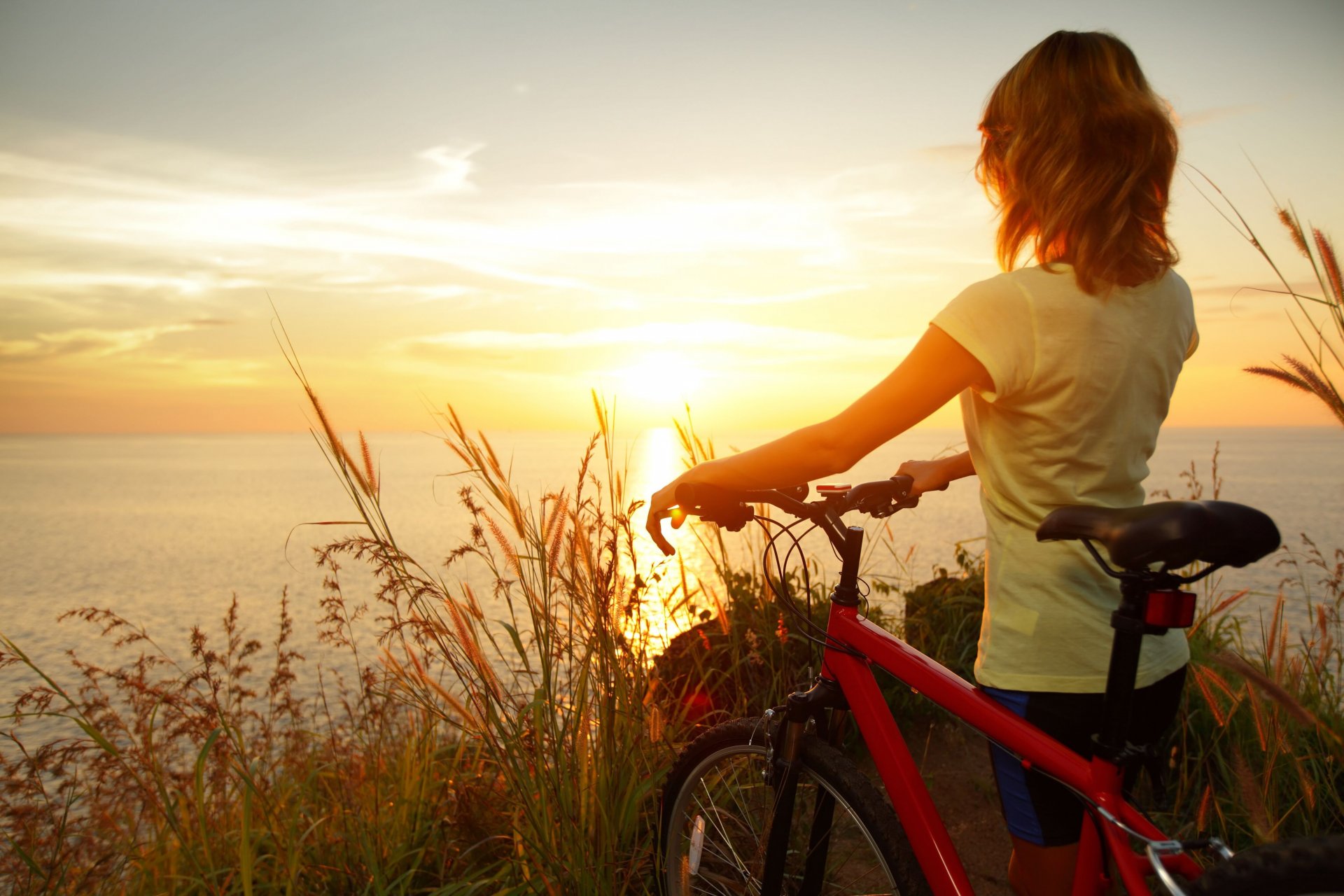 mood girl a woman sports bike nature rye wheat sunset sun sky clouds sea river water reflection background widescreen full screen hd wallpapers