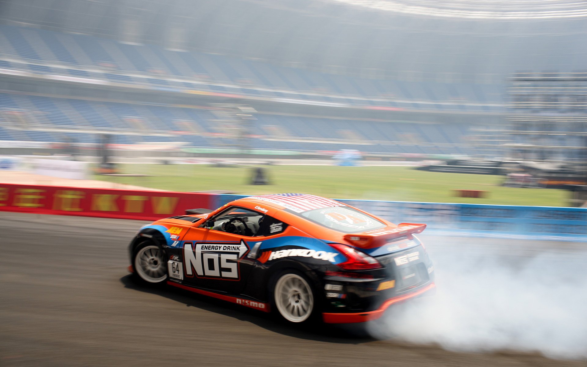 Skidding of a sports car in car racing and smoke