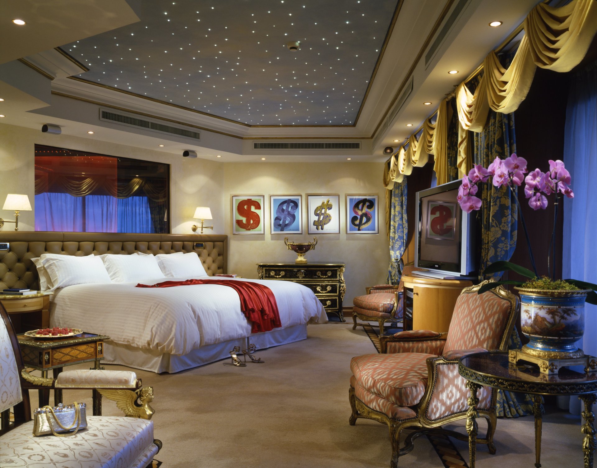 interior desigen suite penthouse bedroom penthouses bed curtains flower armchairs bedside table table tv .