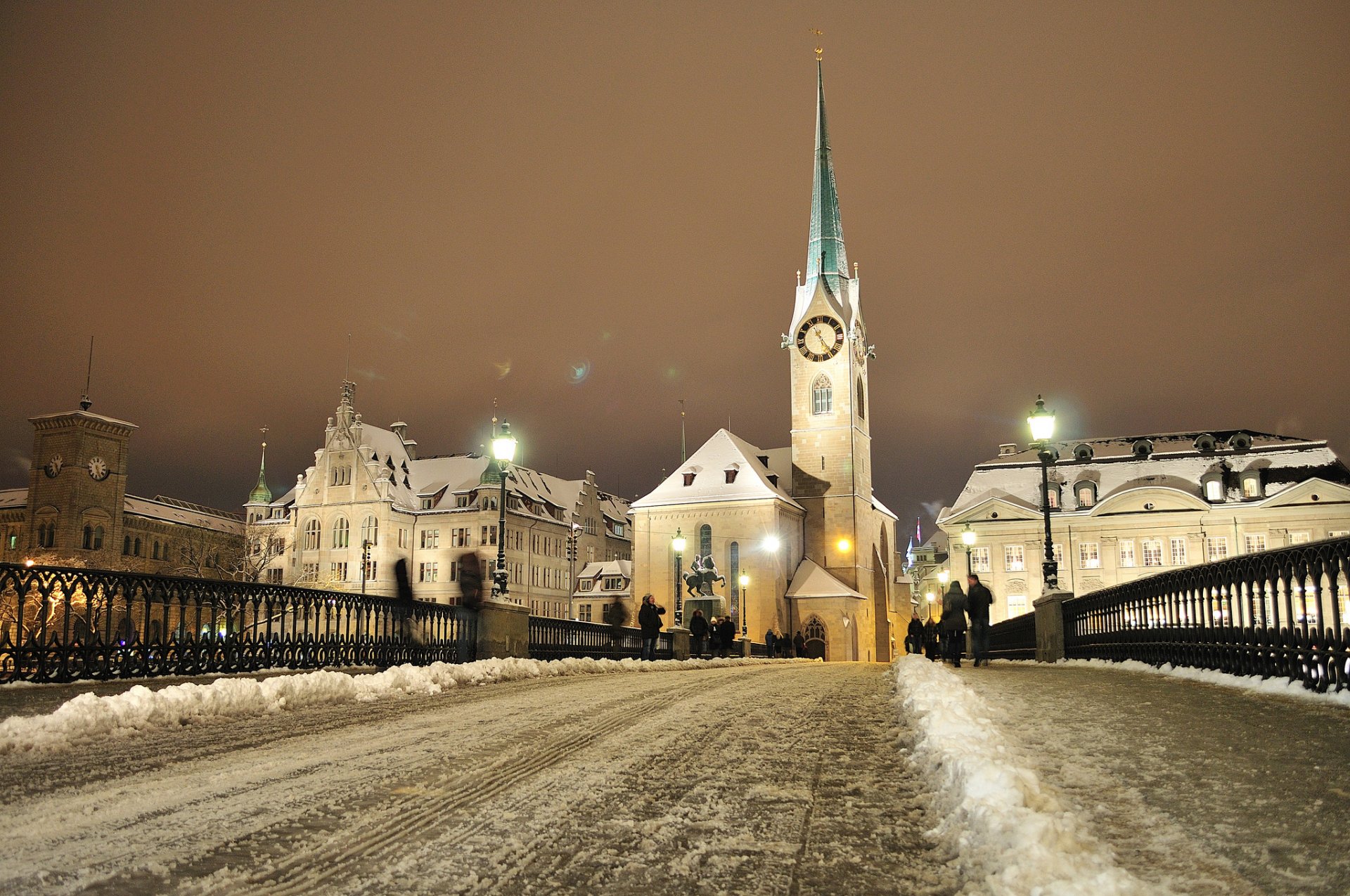 zurich switzerland house tower bridge people winter snow night lights