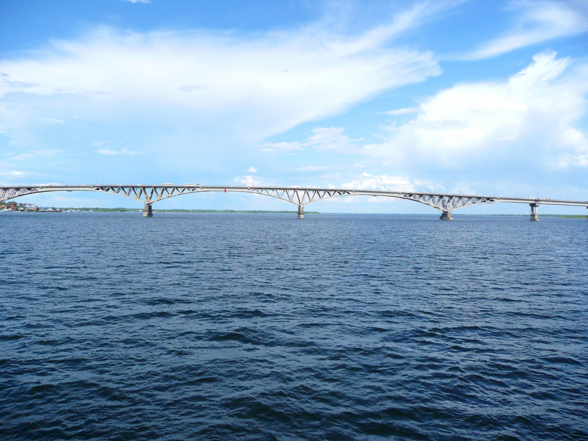 saratov river volga bridge sky clouds