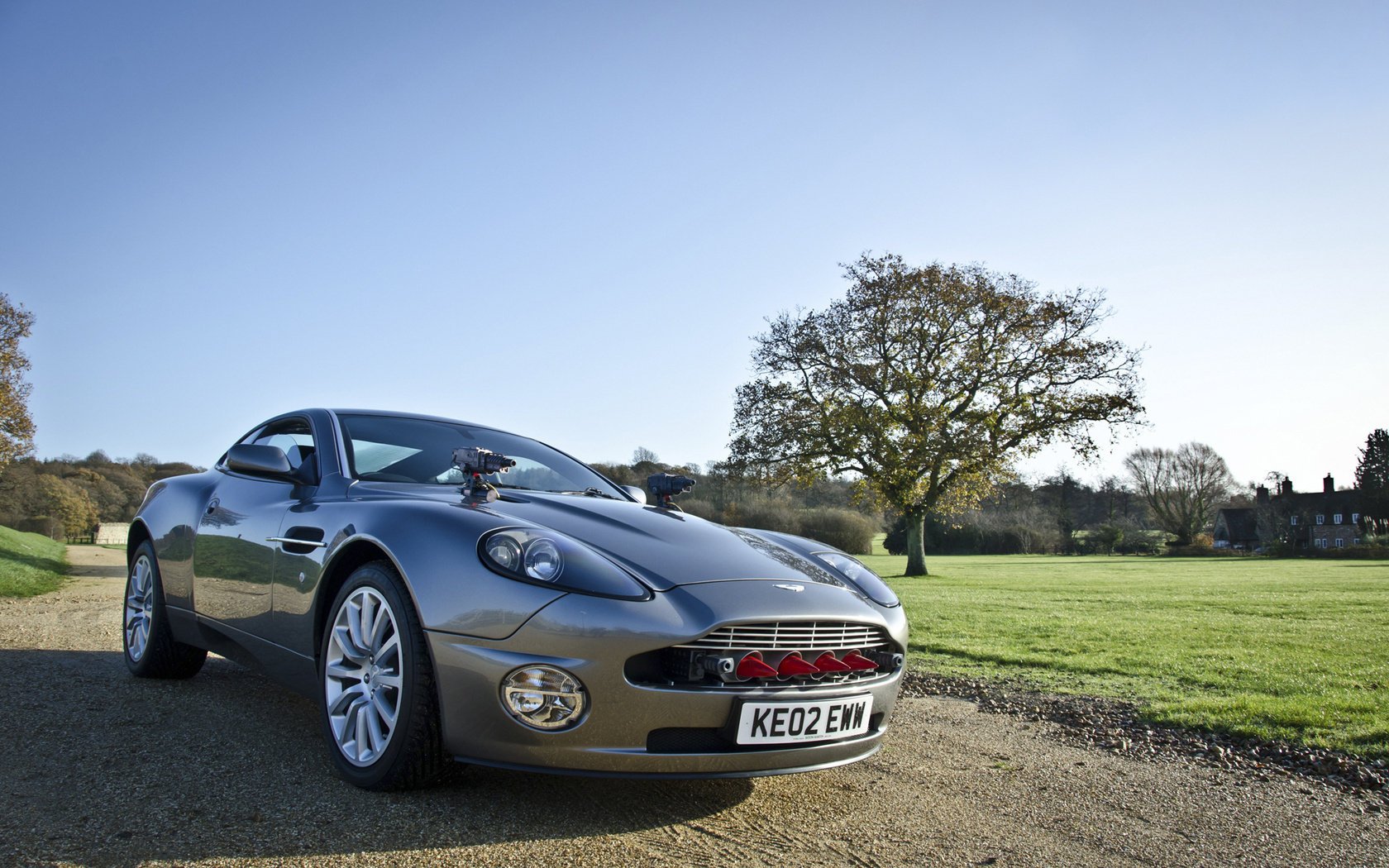 Aston martin on a summer day on the road
