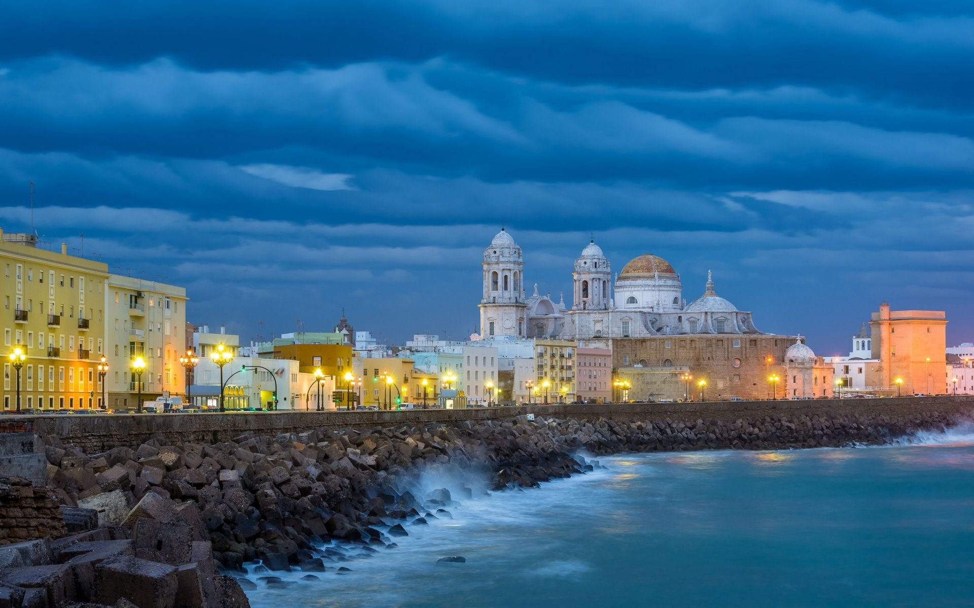 cadiz andalusia spain gulf of cadiz gulf of cádiz embankment buildings cathedral clouds