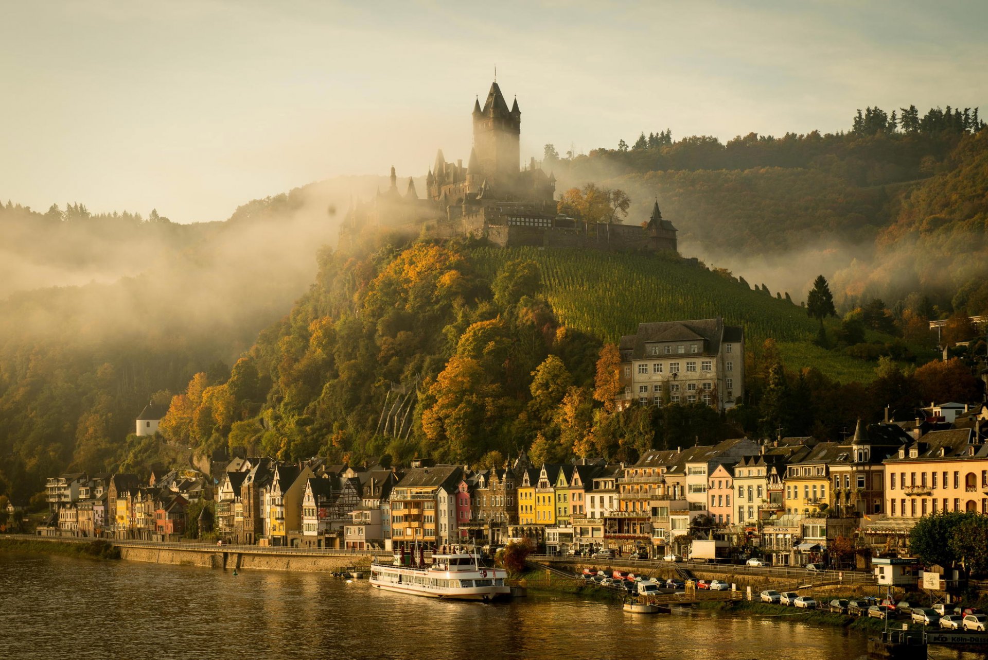 germany town cochem castle autumn morning fog river moselle