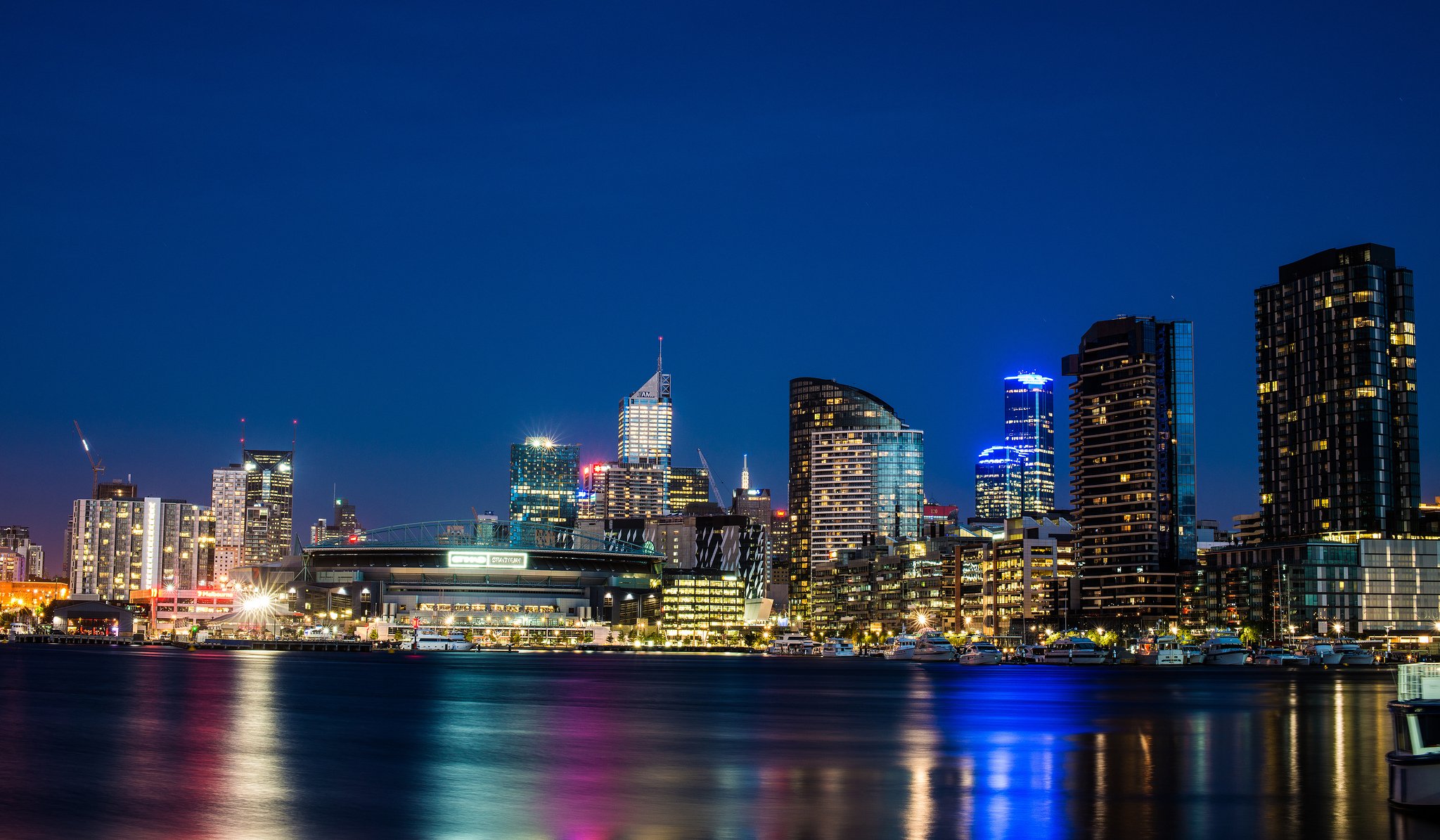 melbourne victoria australia etihad stadium docklands yarra river state yarra river town night house stadium skyscraper buildings