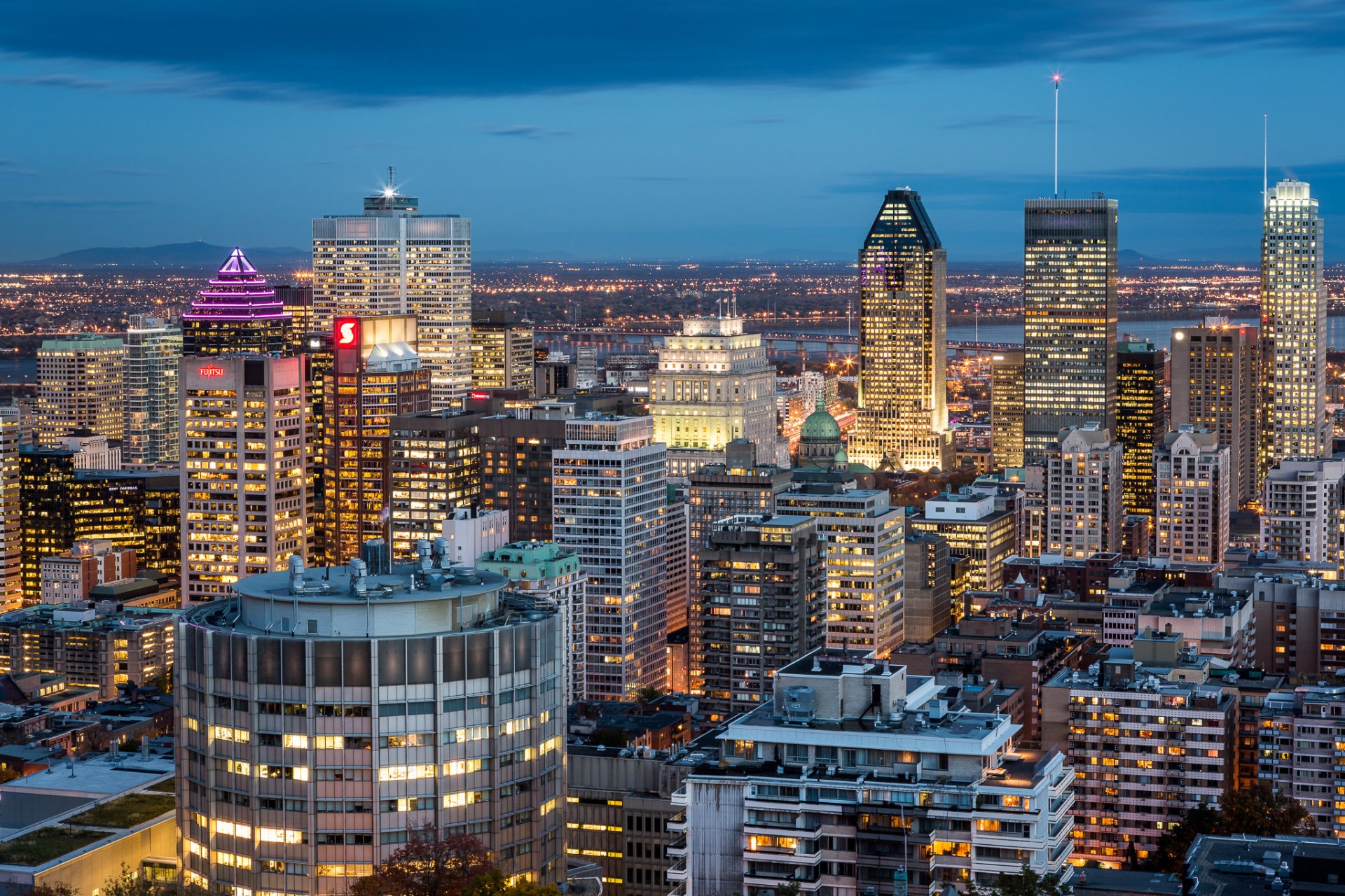 montreal canada quebec city buildings town night blue sky skyscraper house lights lighting