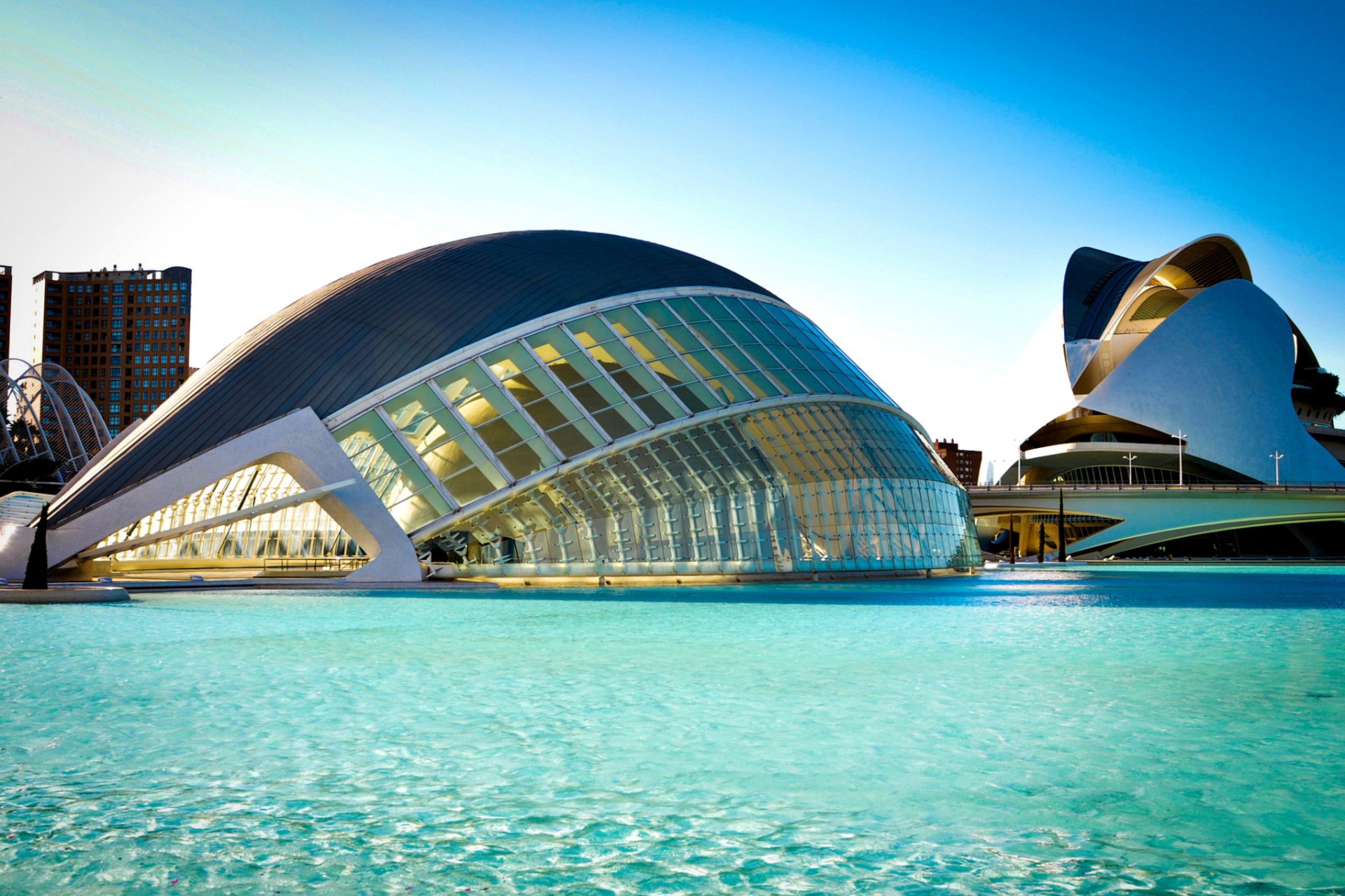 spain valencia l'hemisfèric city of arts and sciences town building architecture river water blue bridge