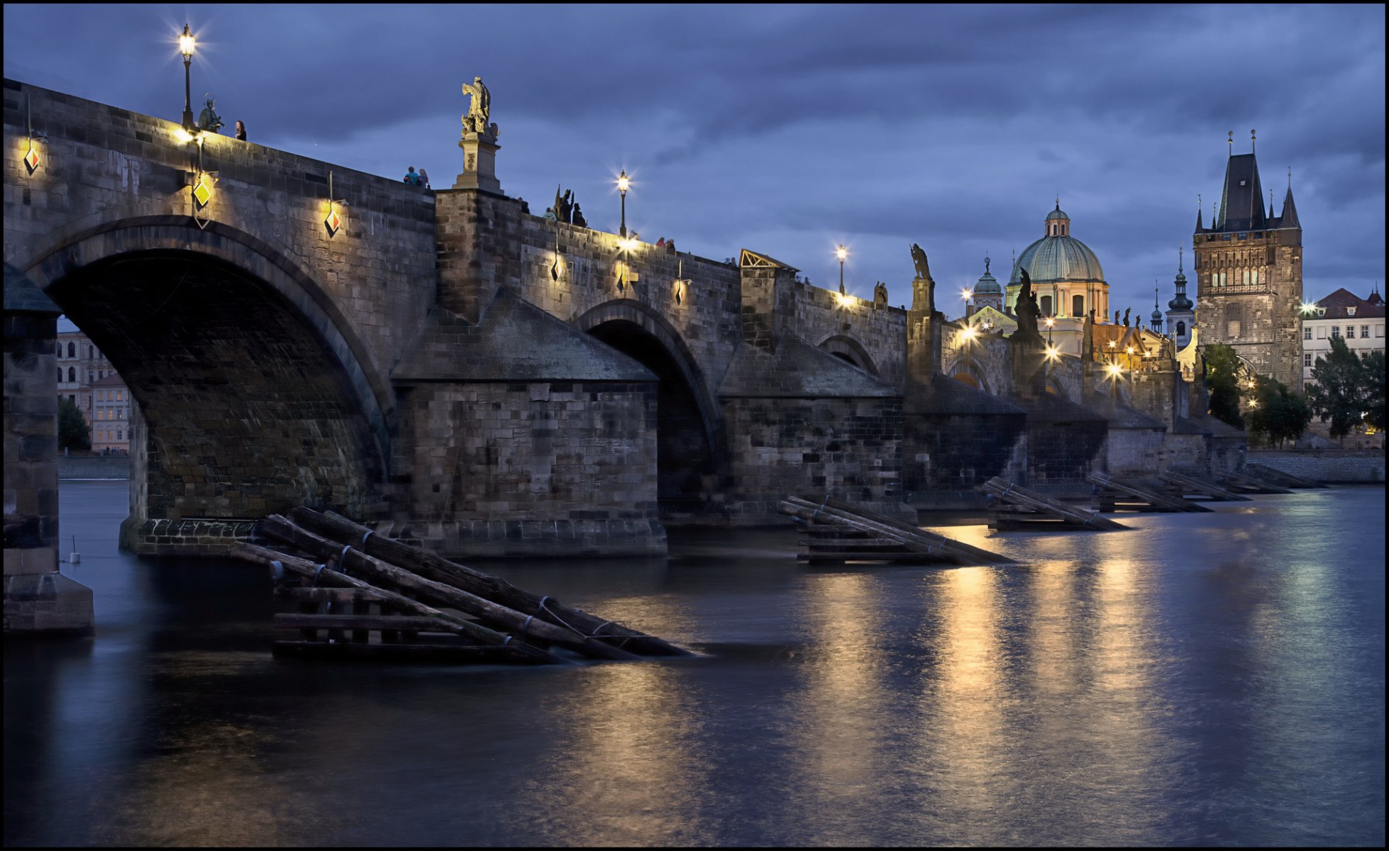praha prague town czech česká republika czech republic josefov karlův most charles bridge river vltava water reflection night light lamps lighting blue sky clouds