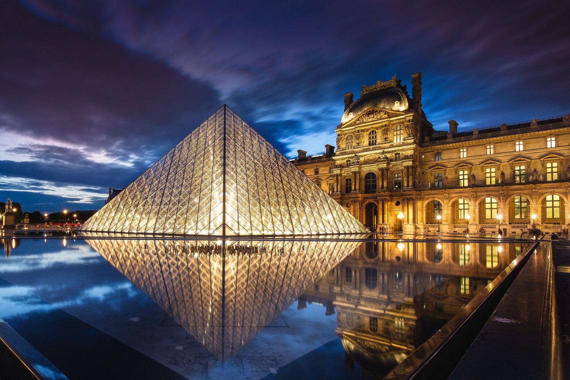 france paris town capital museum the louvre architecture pyramid night lights lighting lamps light blue lilac sky clouds reflection