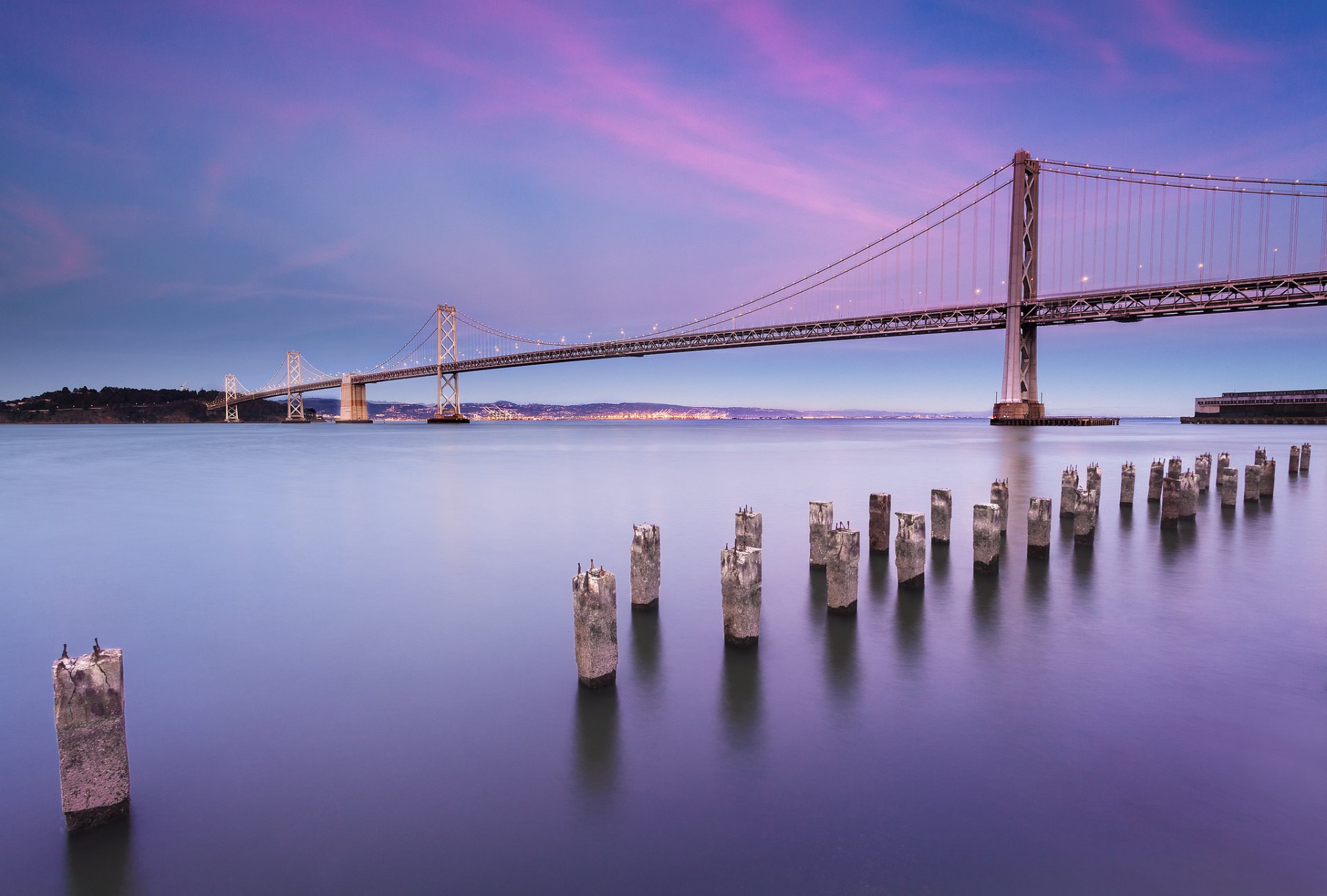 usa california san francisco city bay bridge united states town bridge lamps lighting strait beach night lilac sky clouds landscape