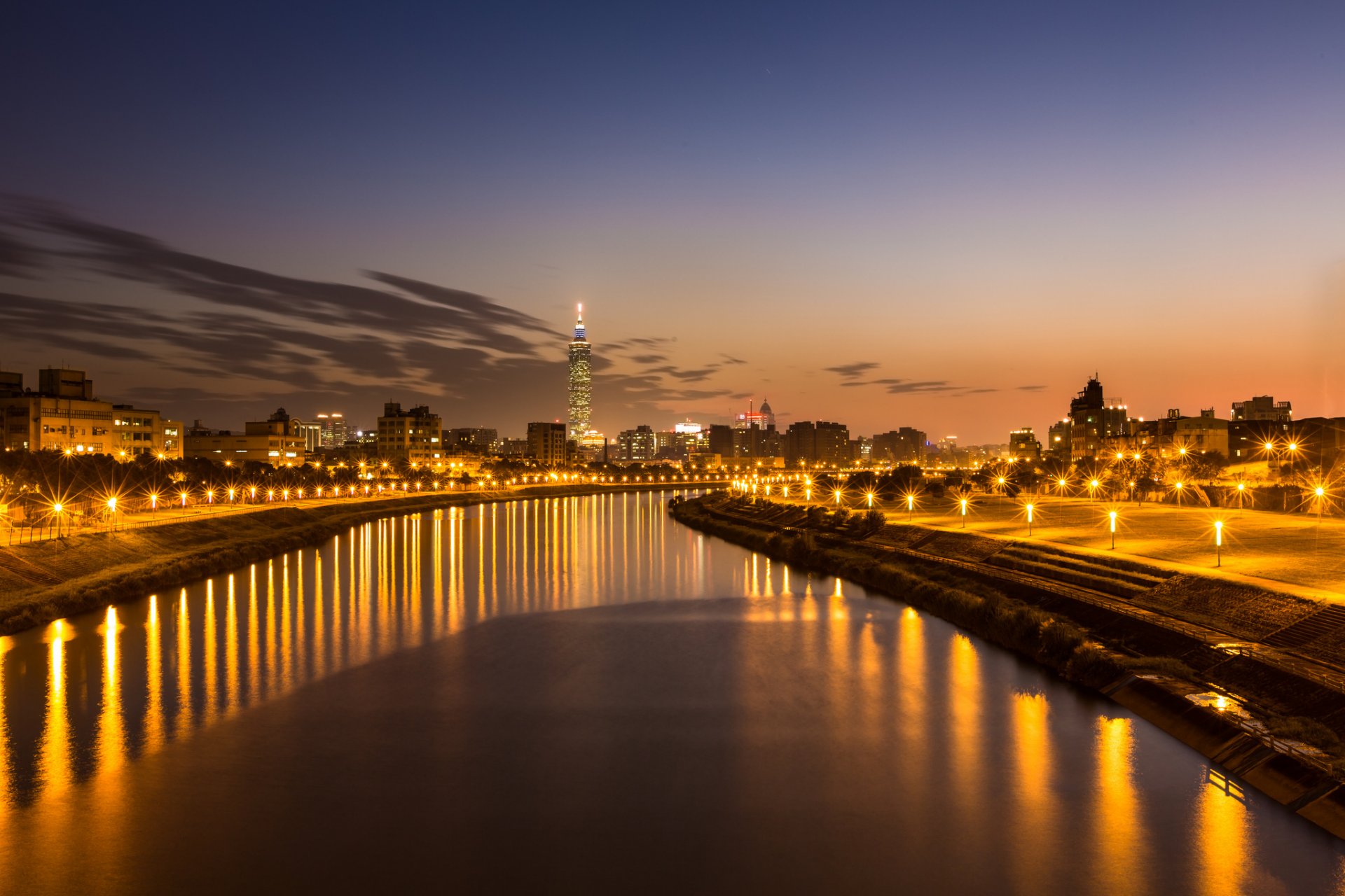 china taiwan taipei town river night orange sunset sky clouds light lights lamps reflection