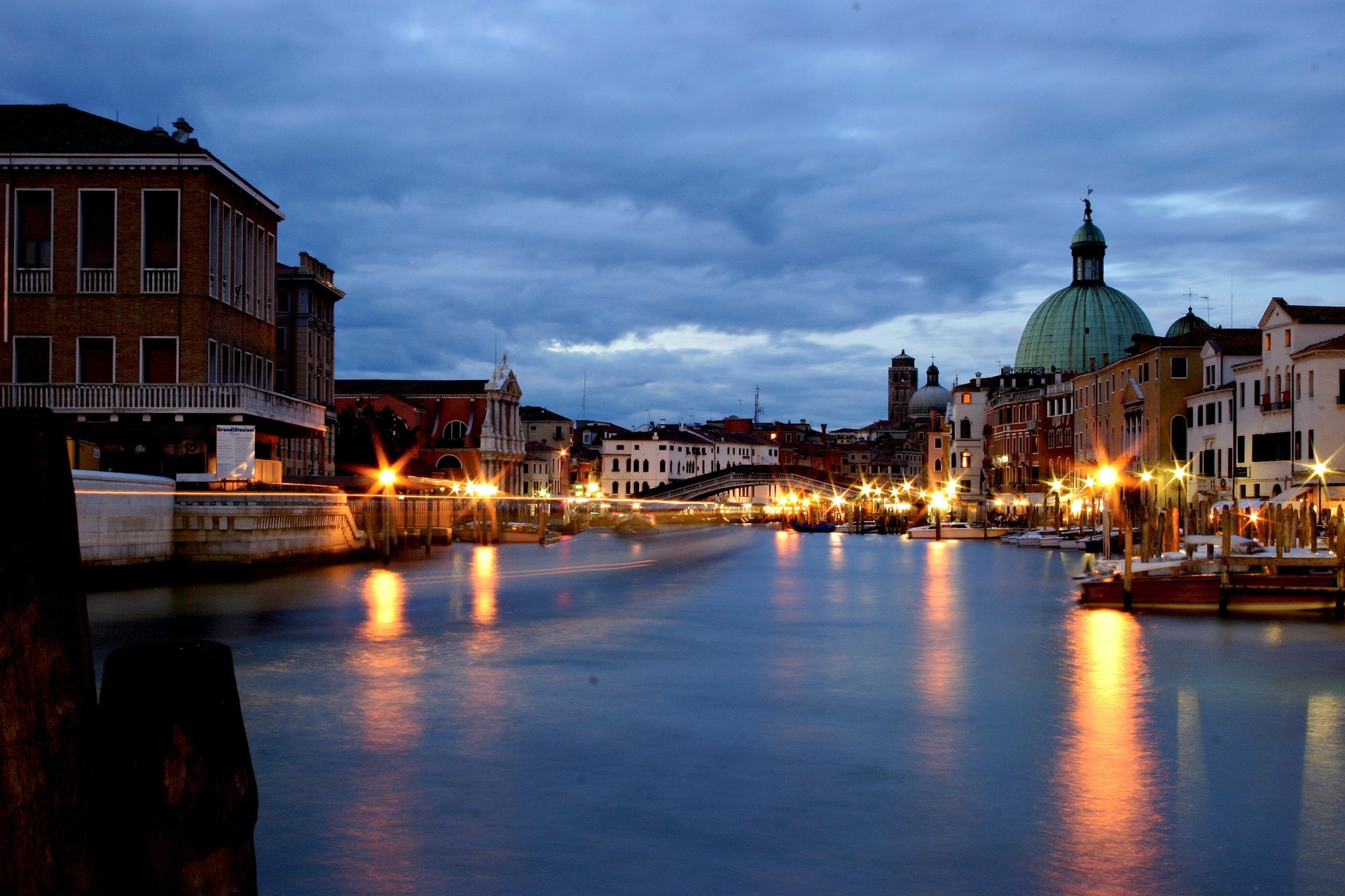 venice italy canal grande grand canal bridge water reflection lamps architecture house buildings night sky clouds