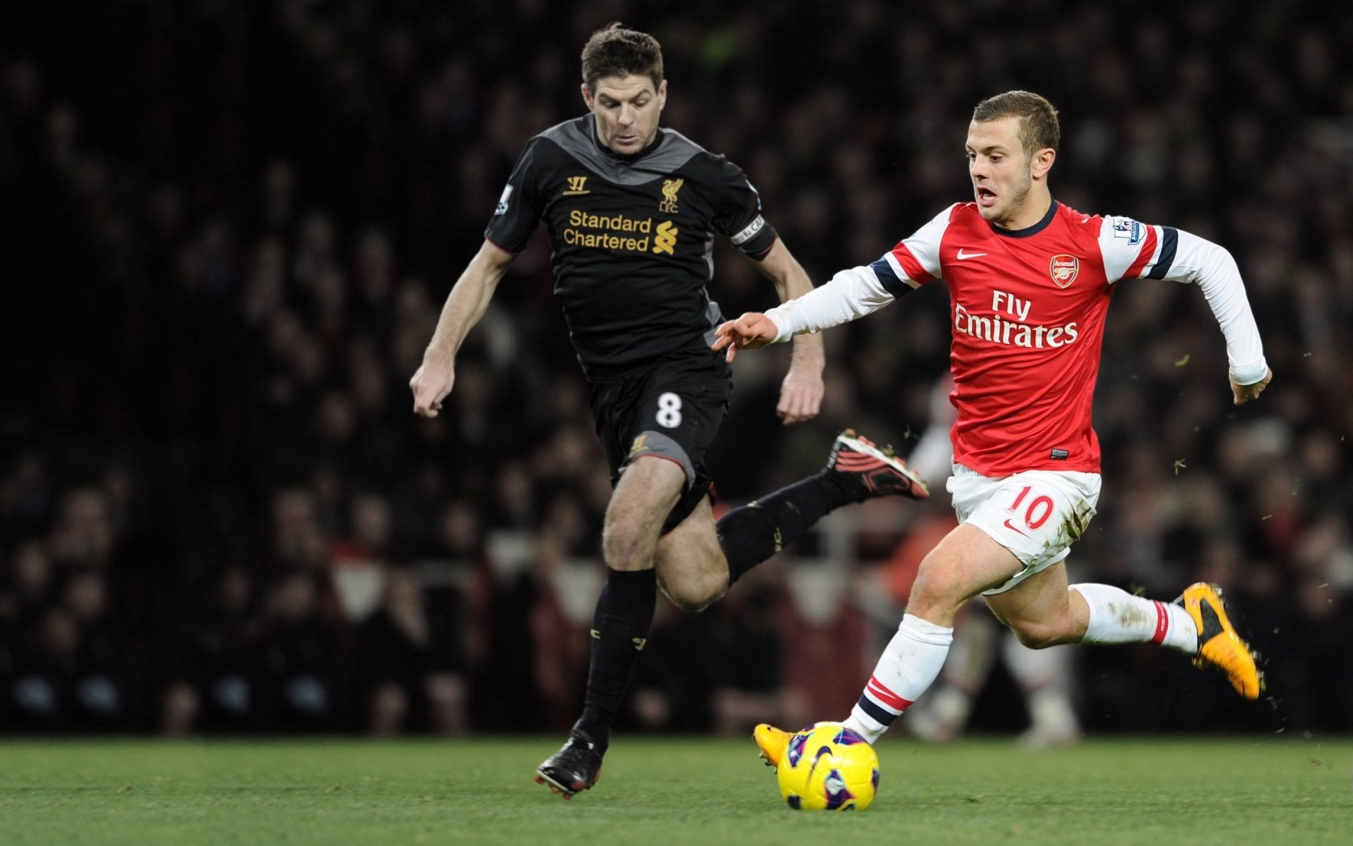 arsenal football club the gunners gunners jack wilshere midfielder the field rostrum steven gerrard