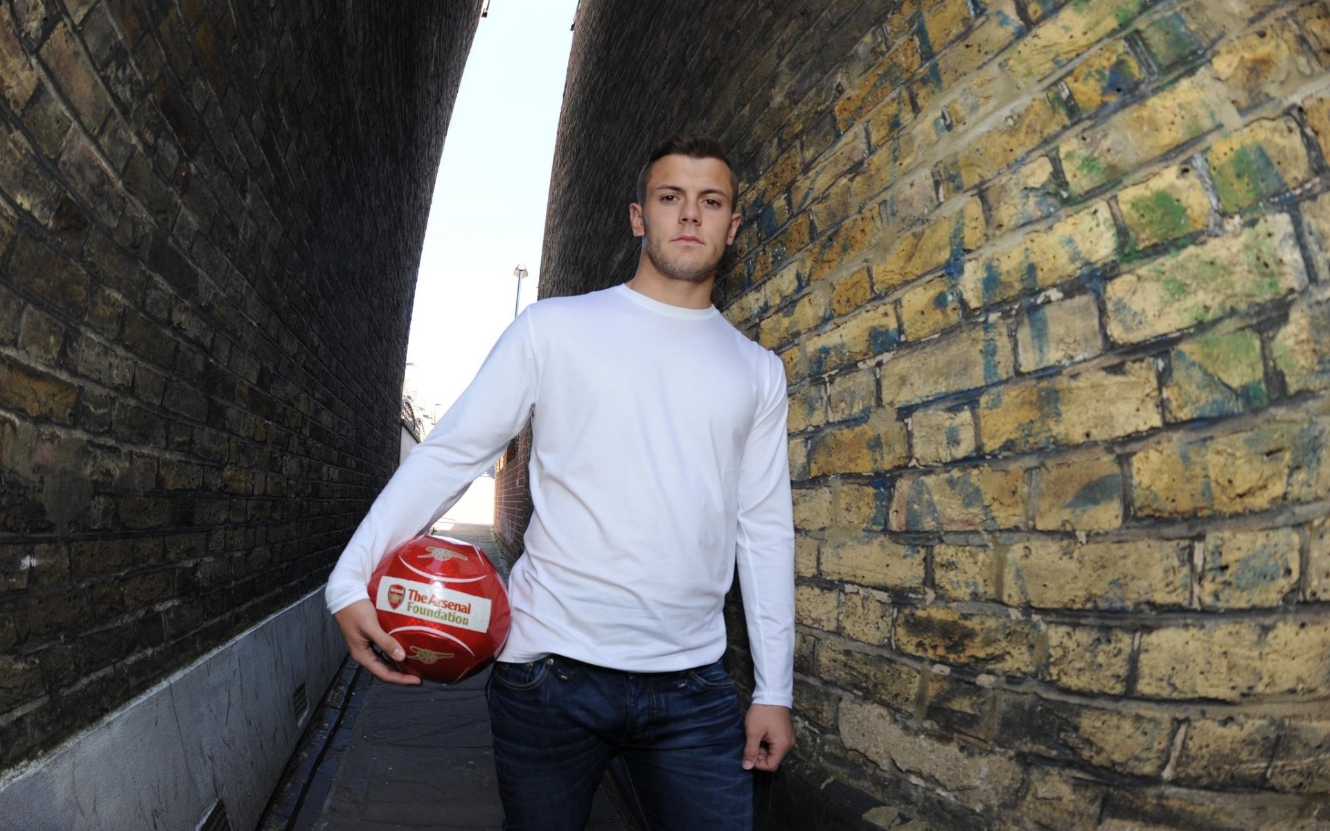 arsenal football club the gunners gunners jack wilshere midfielder ball wall background