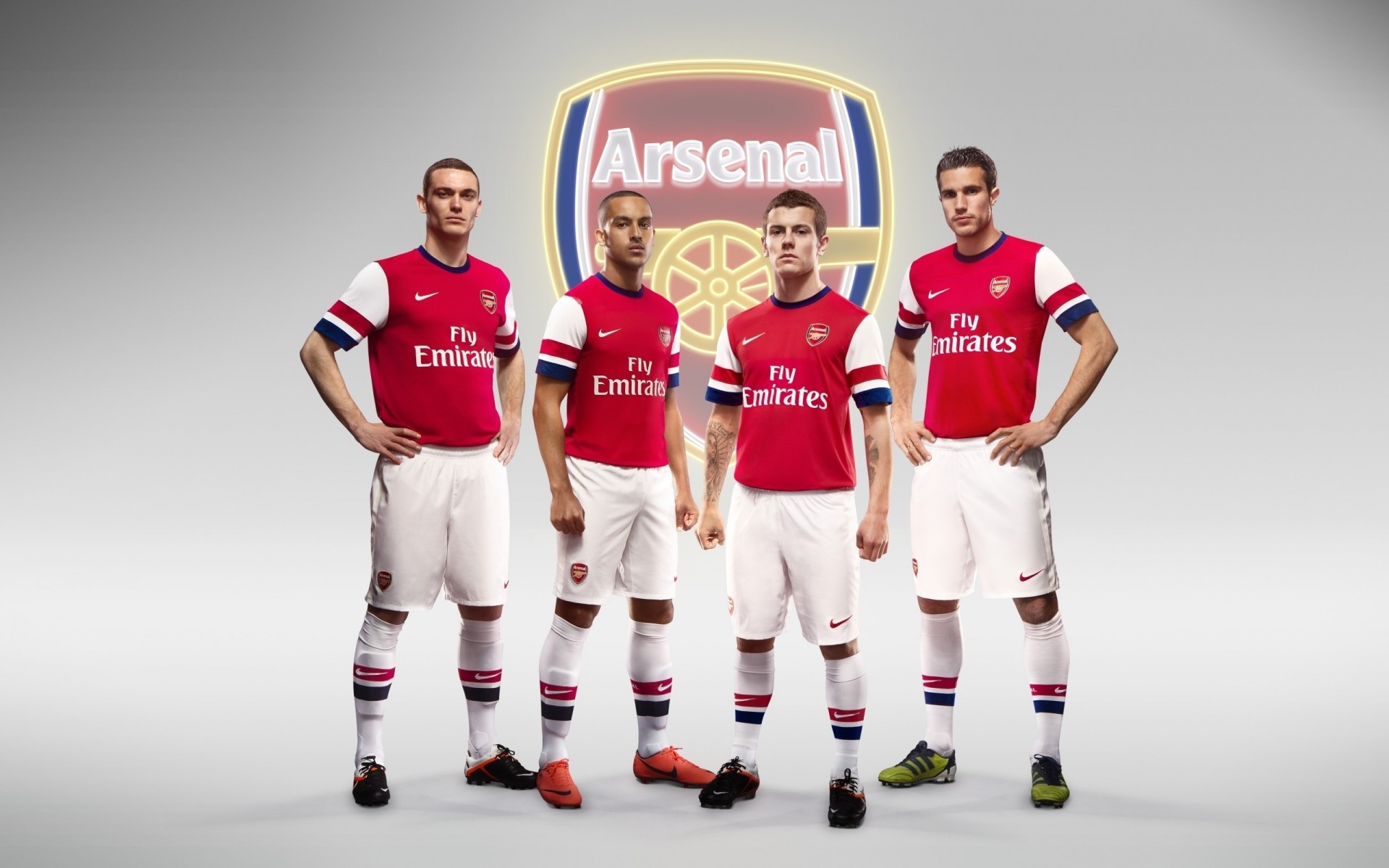 football club emblem players arsenal robin van persie gunners thomas vermaelen artillerymen background theo walcott jack wilshere