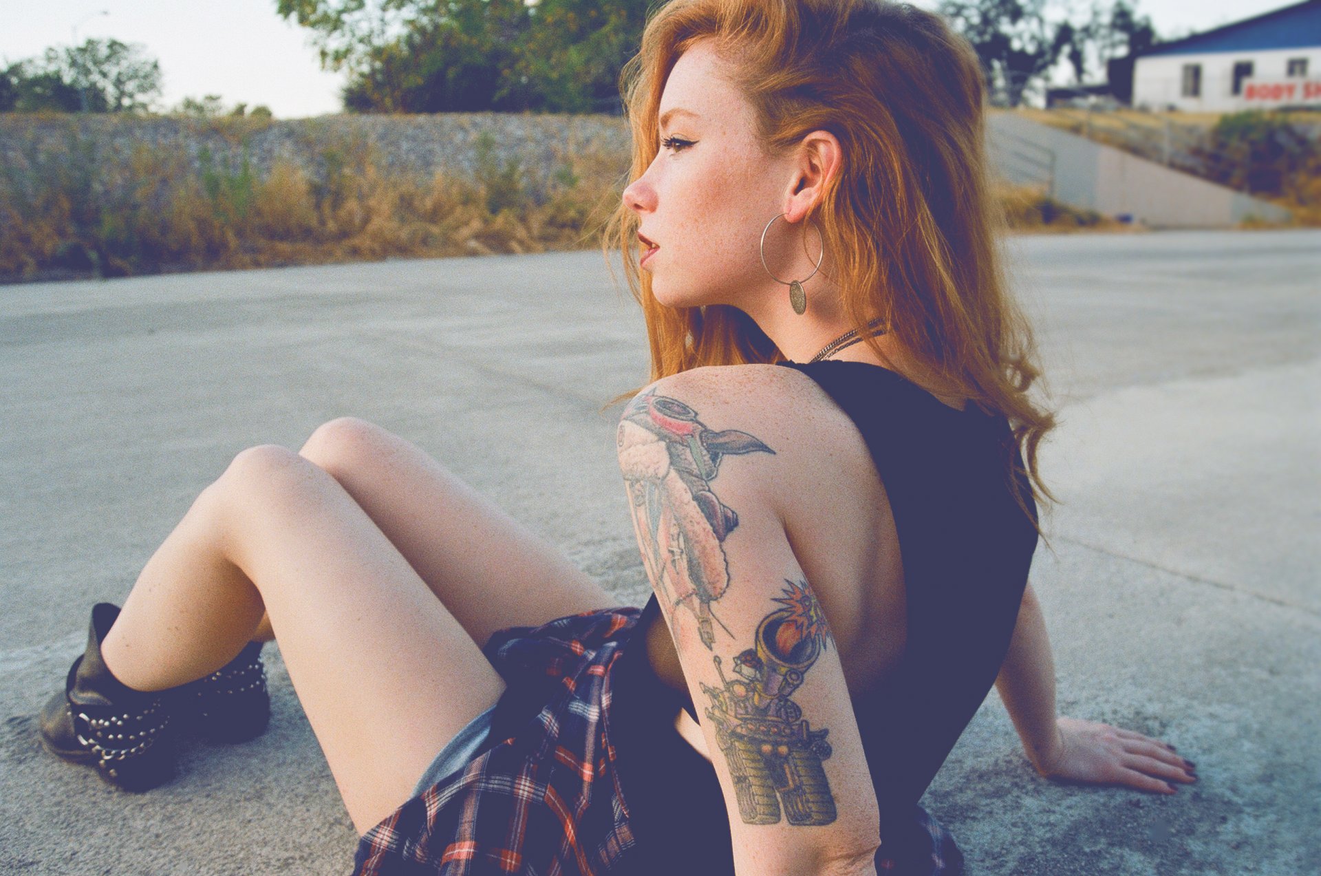 hattie watson model girl woman female tats tattoos tattoo redhead earring sitting