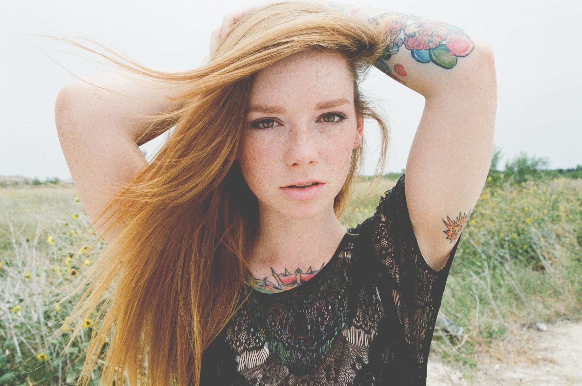redhead model hattie watson tattoos tattoo tats girl female woman grass freckles