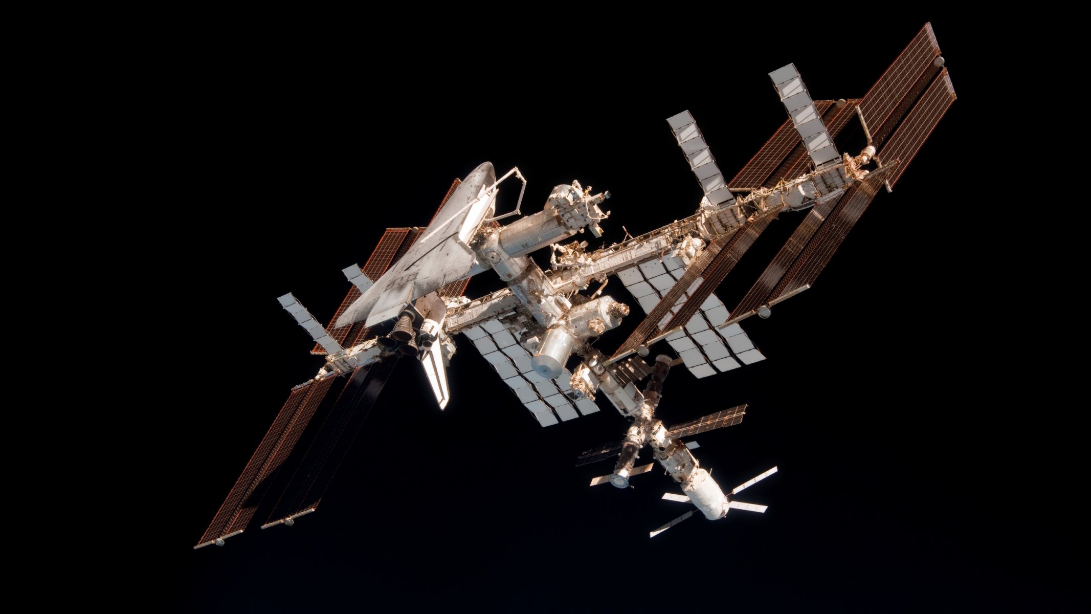 background space station shuttle solar battery panel