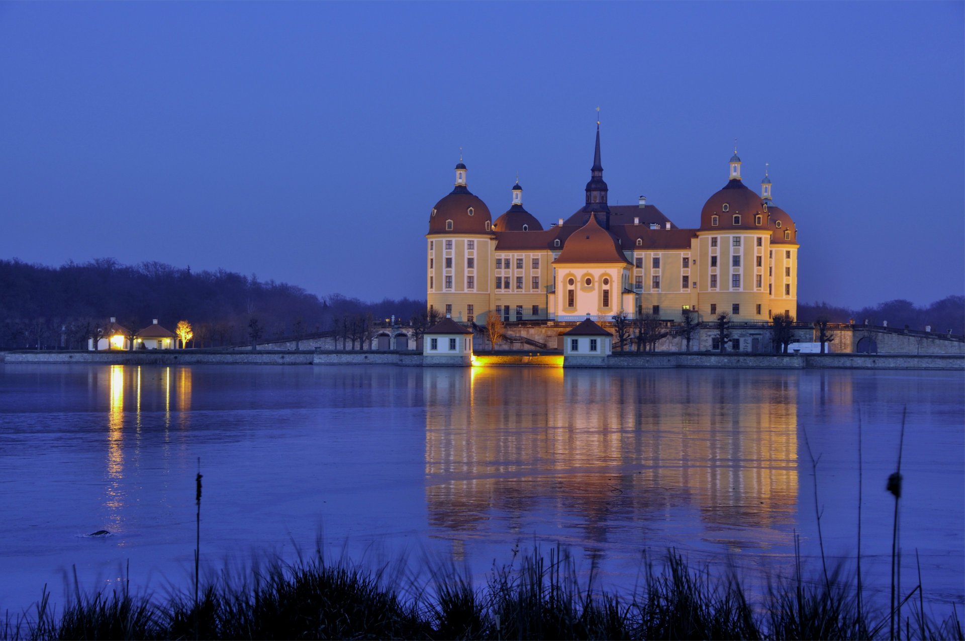 Evening castle in the middle of the lake