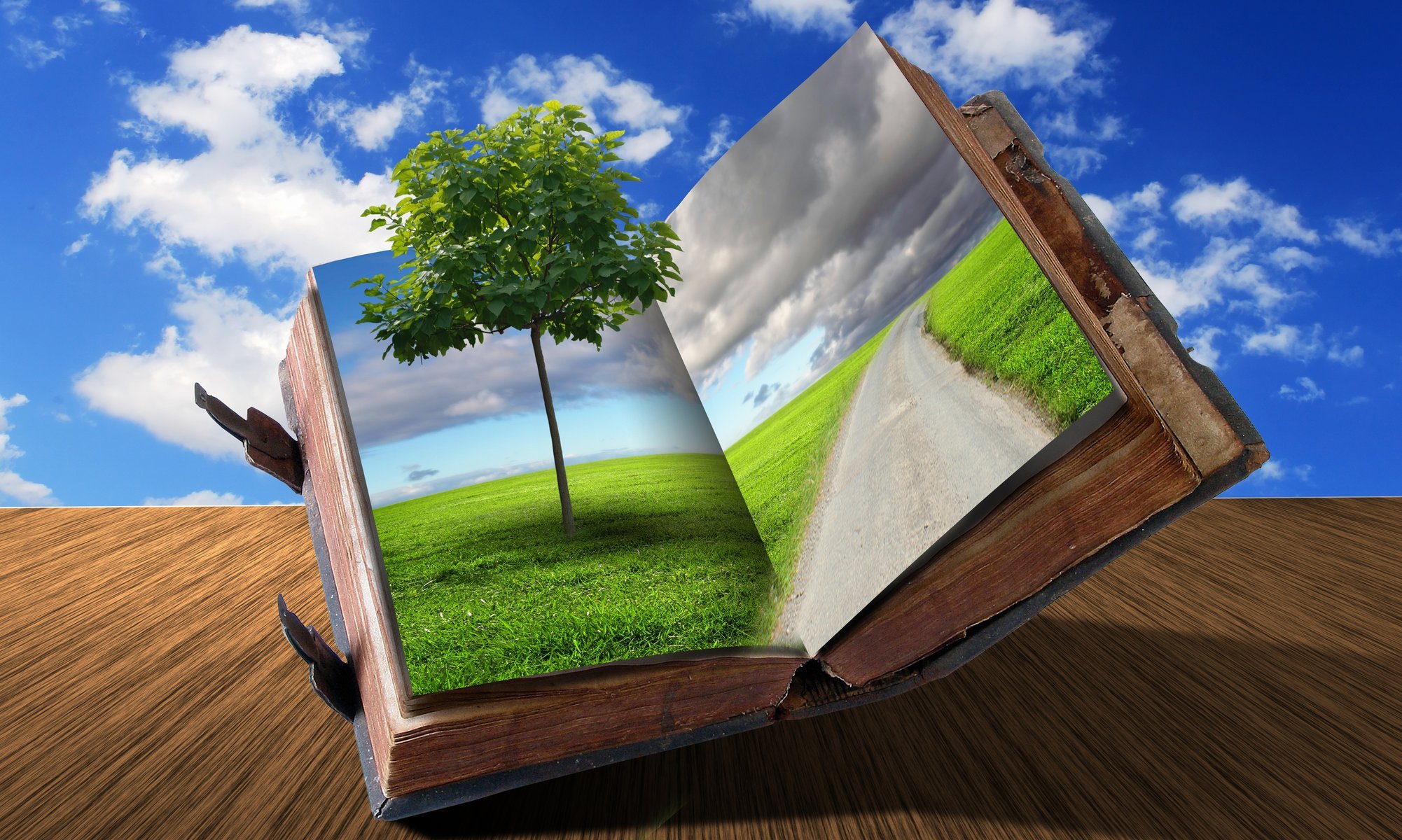 Creative book with the image of the road to the clouds