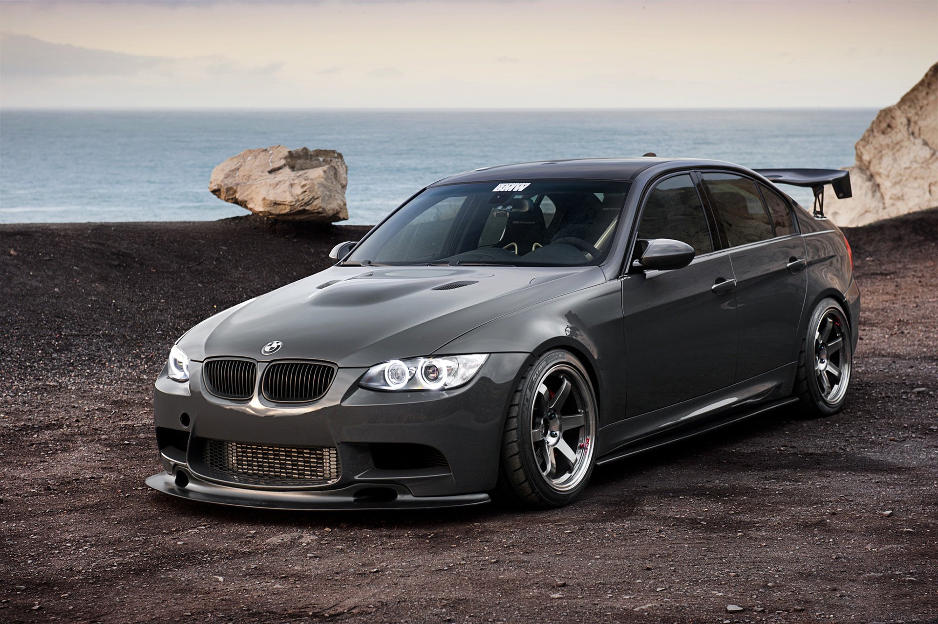 Black BMW at sea