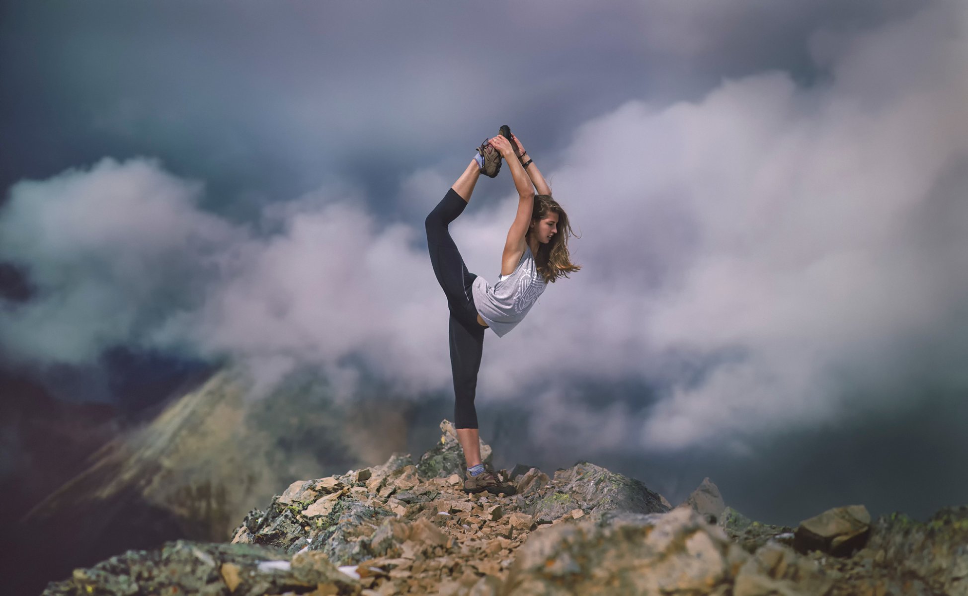 stretch girl athlete stretching clouds mountain