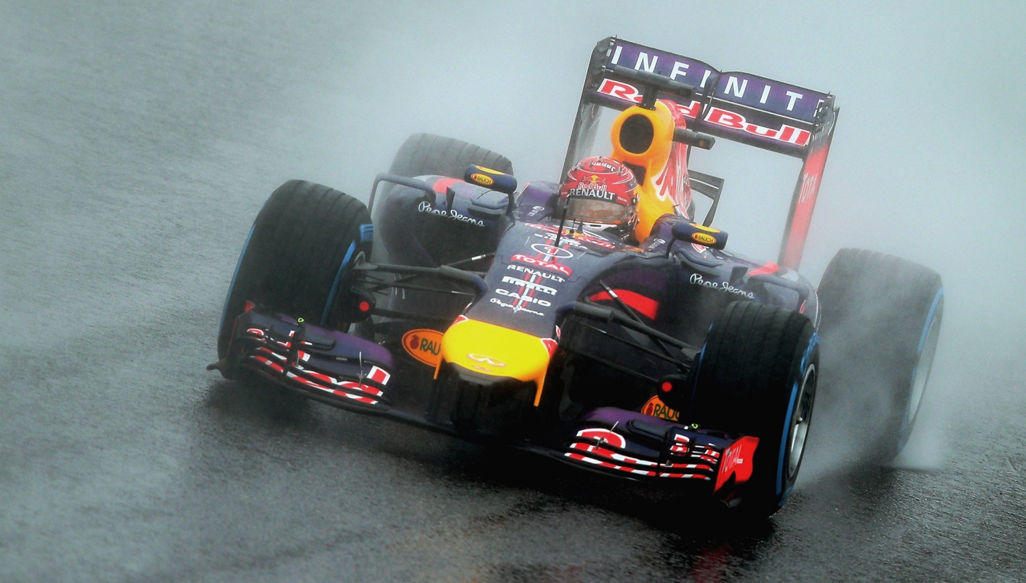 sebastian vettel f1 rider champion formula 1 japan rain