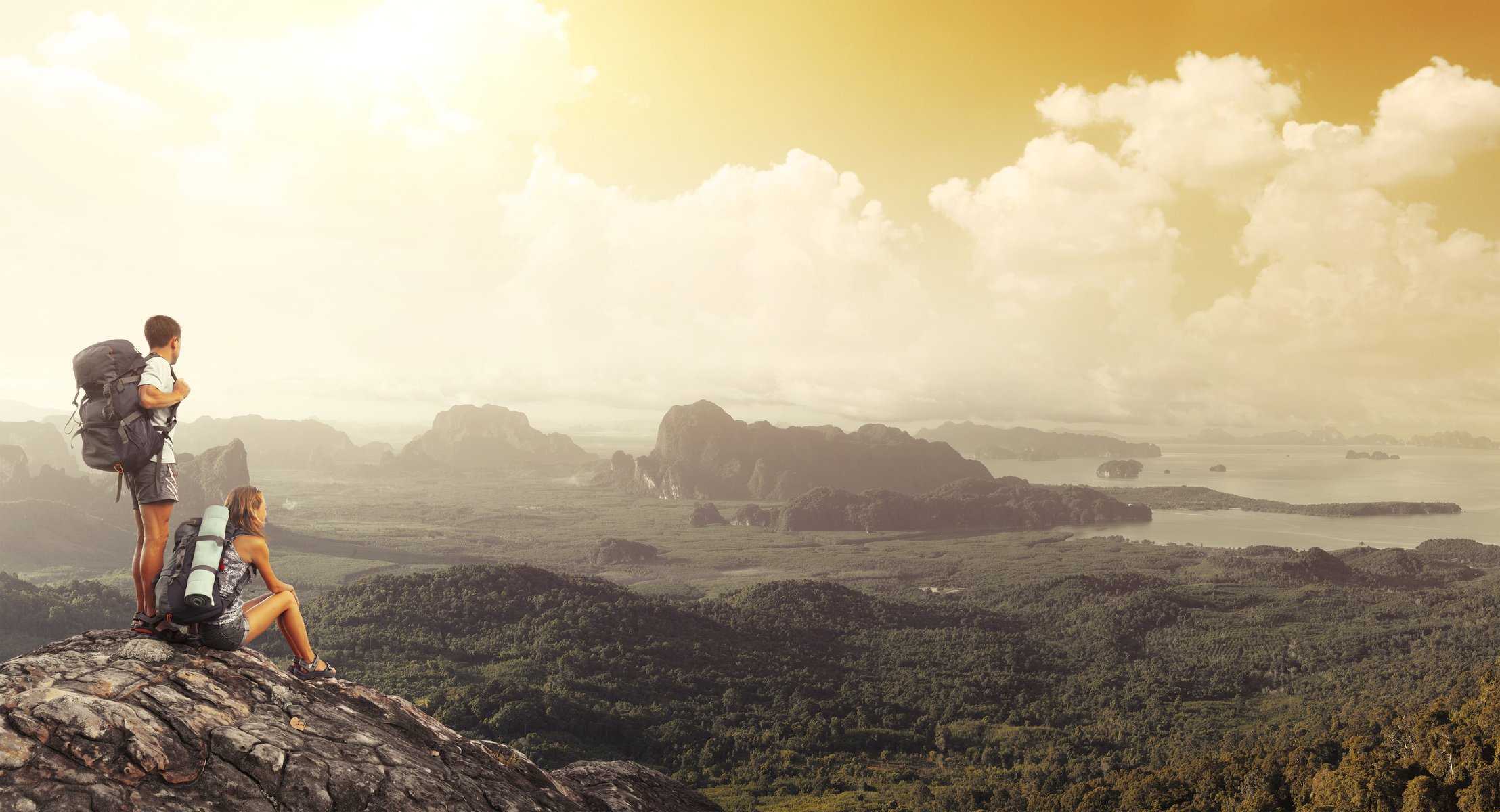 mountain clouds people backpacks tourists