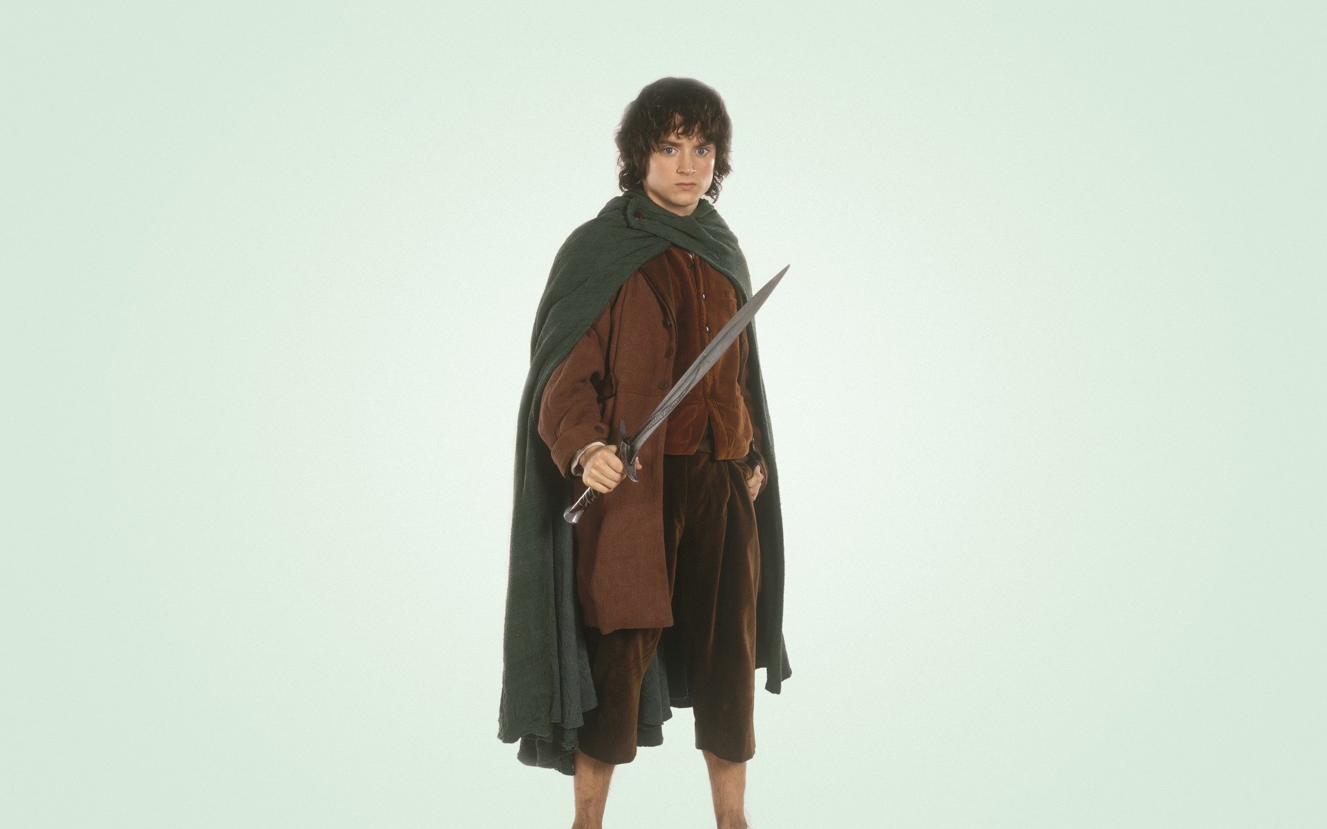 elijah wood sword frodo baggins light background lord of the rings the lord of the rings