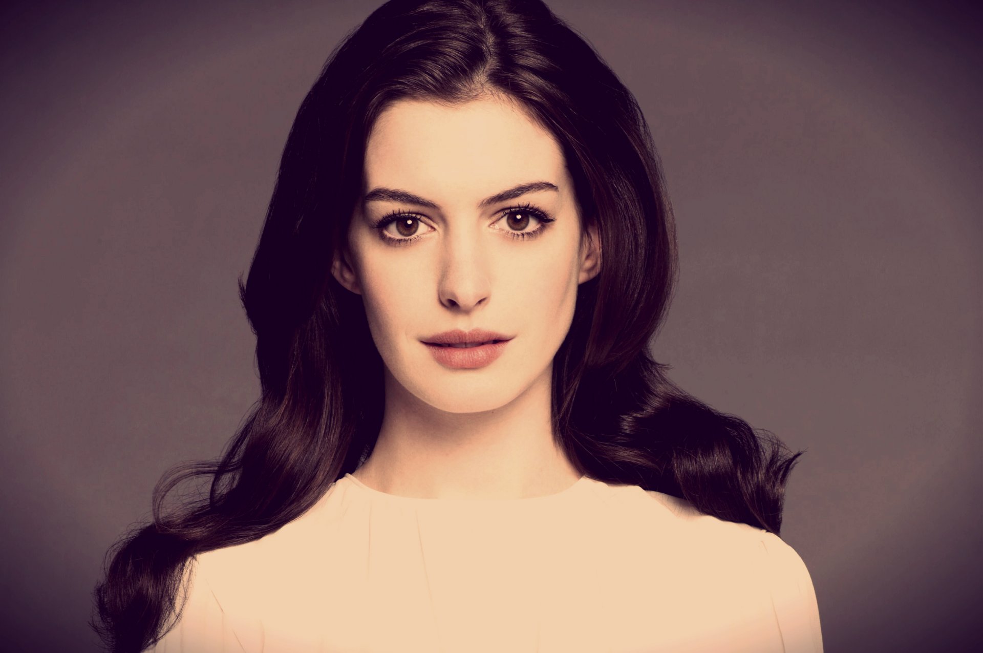 anne hathaway actress face styled hair view