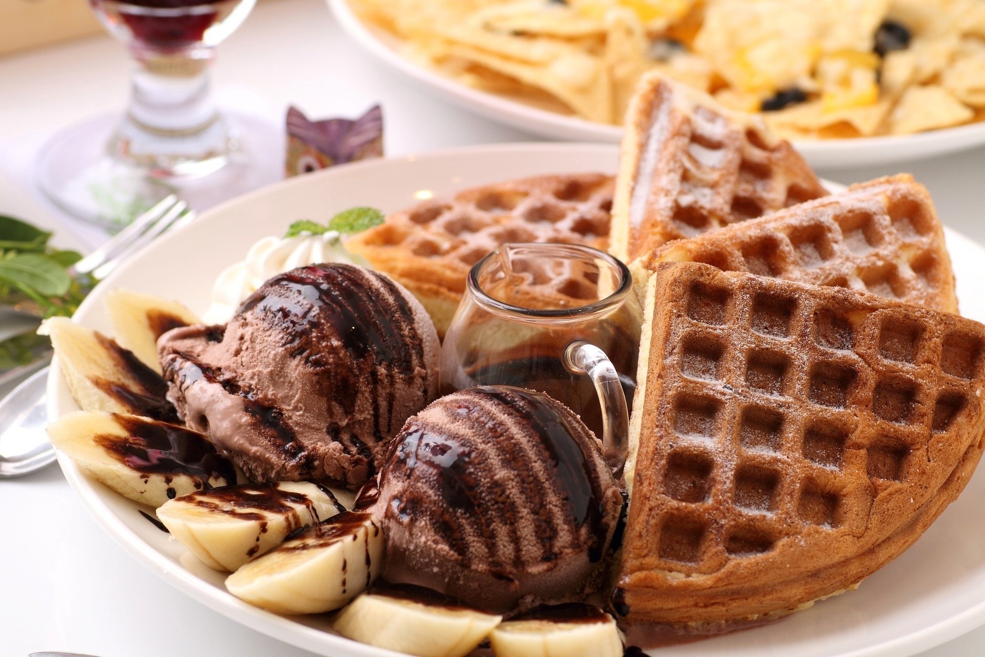 Chocolate waffles with banana and ice cream