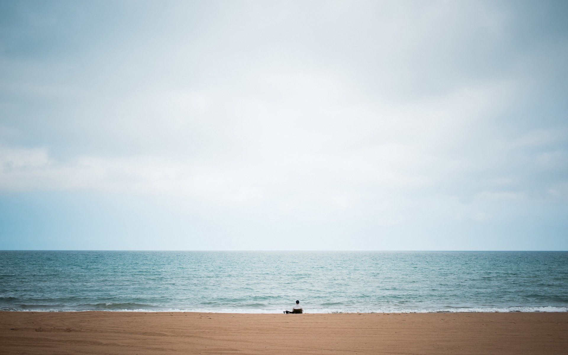 Loneliness on the sandy beach by the sea