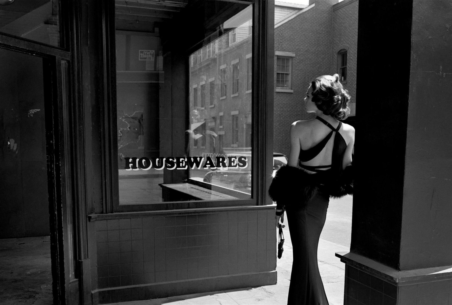 showcases empty shop doors street girl spin dress day photo black and white